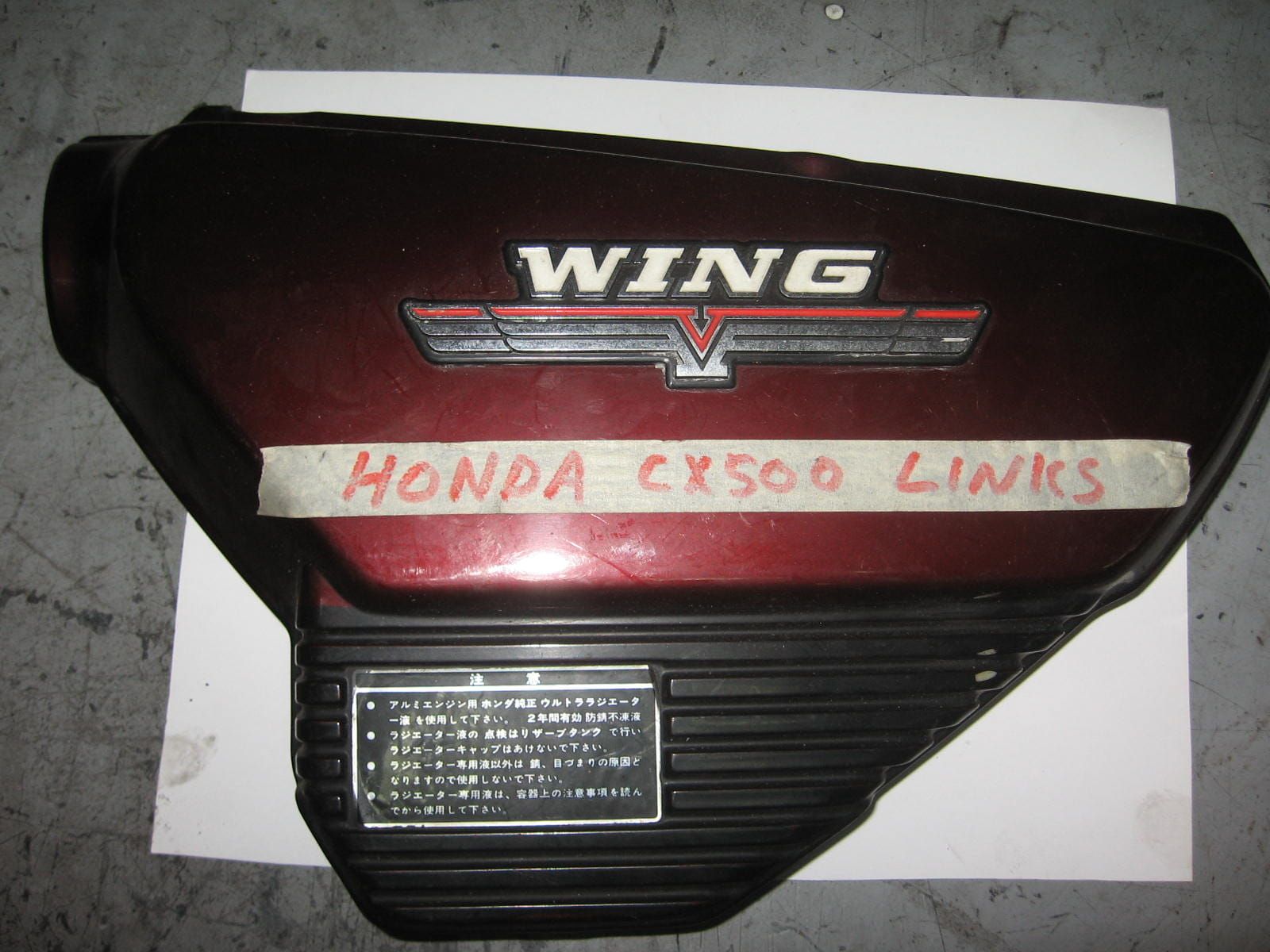 zijkap links rood ---cx500		83600-415-000