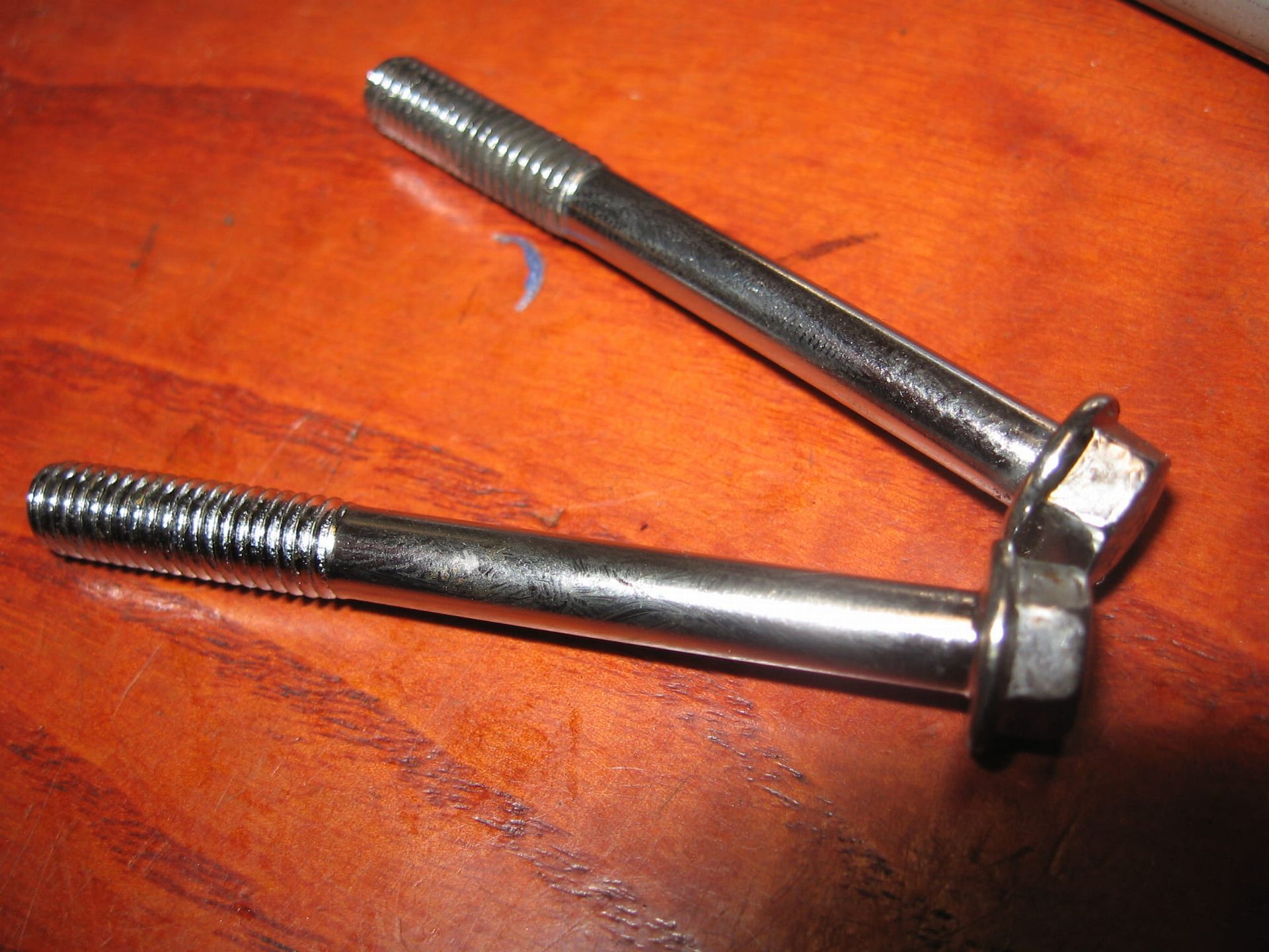2x flensbout chroom m6x54 , koppelingsdeksel 		01547-06557