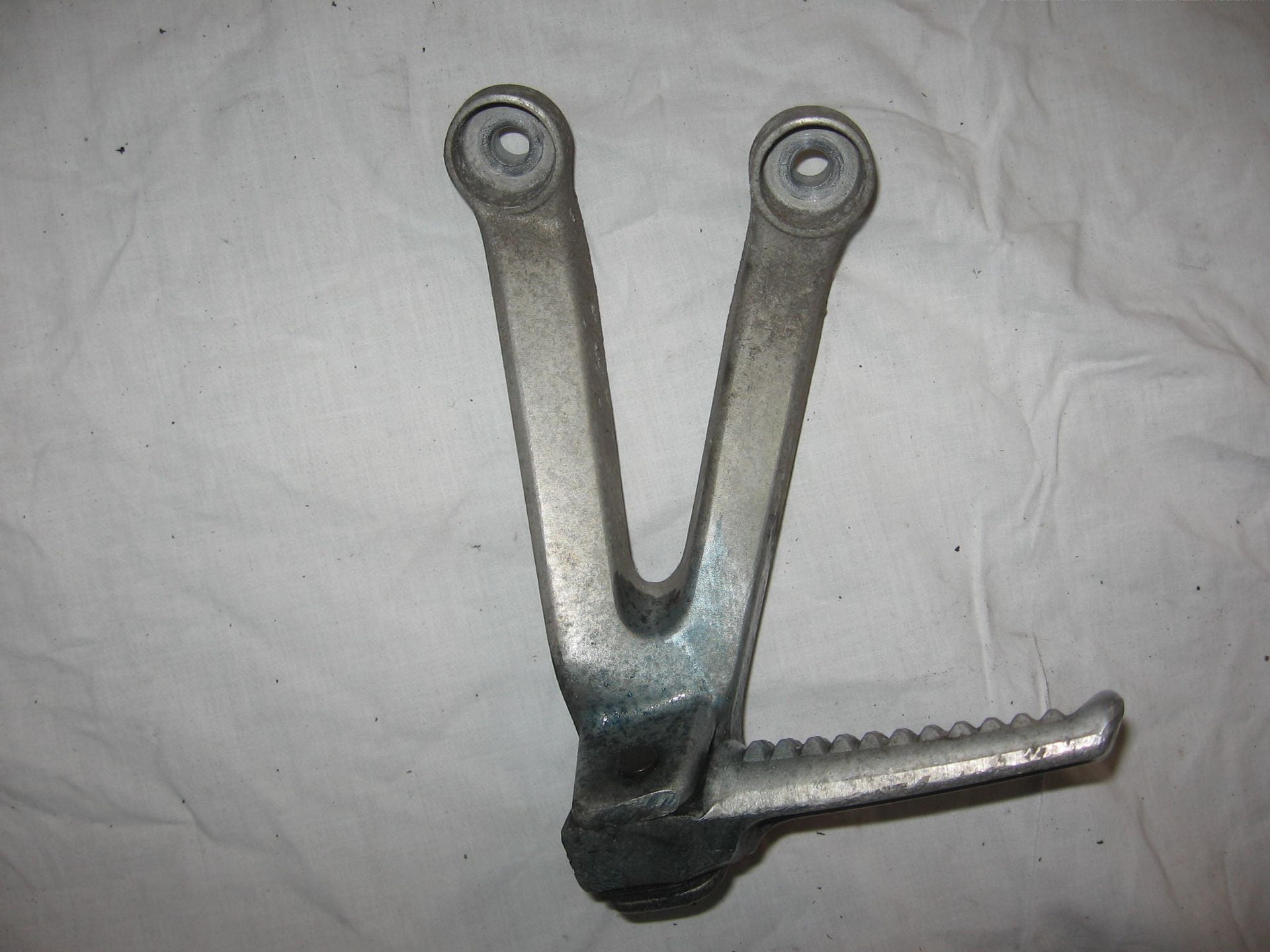 houder voetsteun links passagier met voetsteun // cbr900rr 92-99		50760-MW0-000 +
