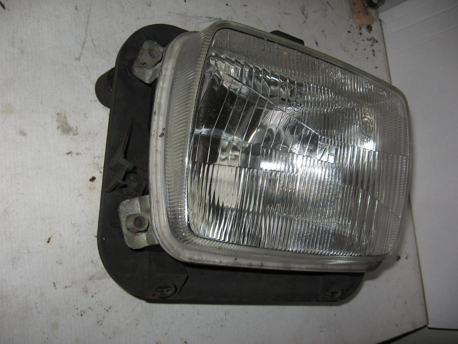 koplampglas met beugel	k75s   ,r100 1989- , f650 97-2000	63121459602 + 63121459604