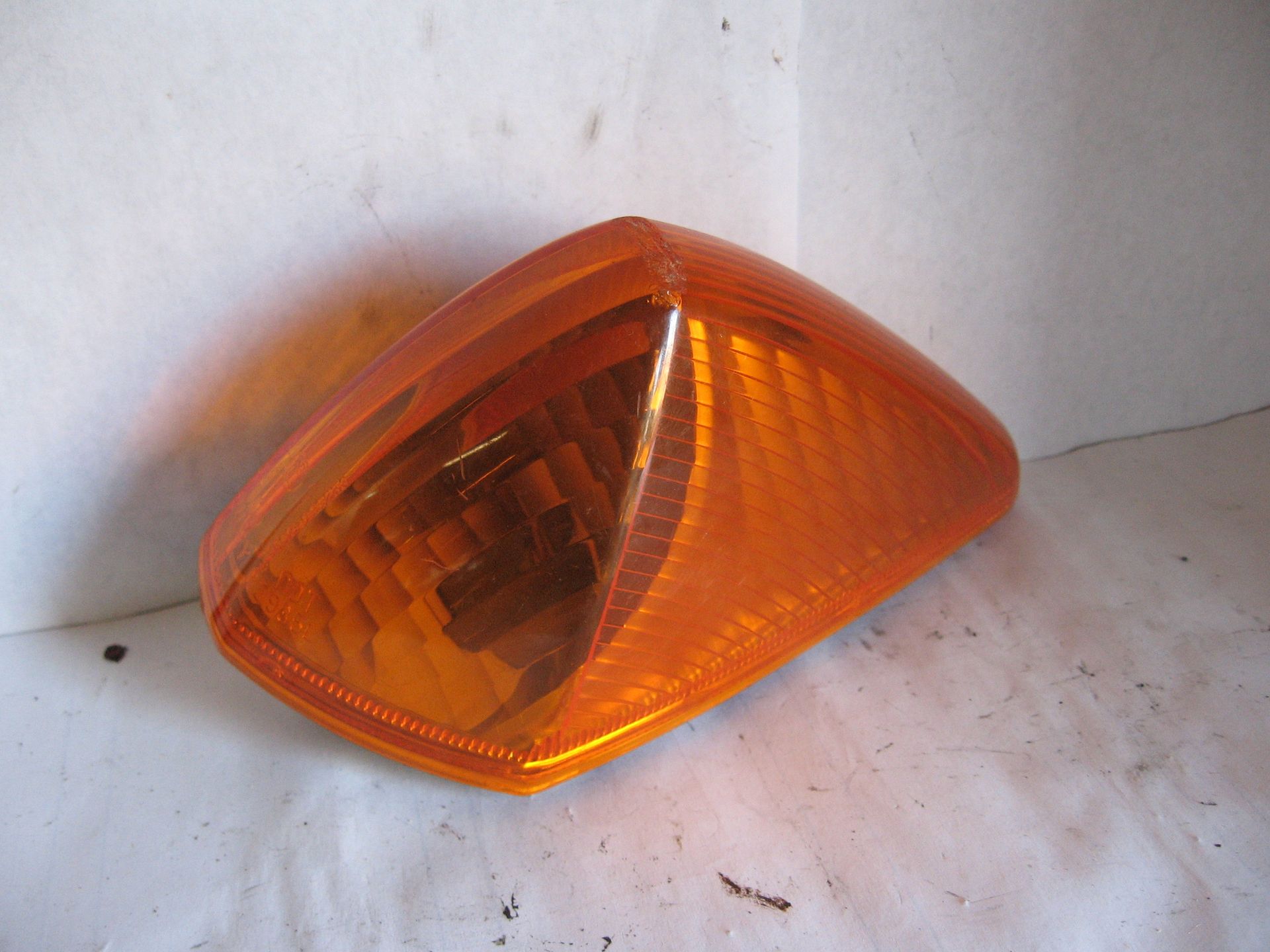 knipperlichtglas links voor xl1000v 99-2002 , schaafplek op bovenpunt		33460-mbg-000