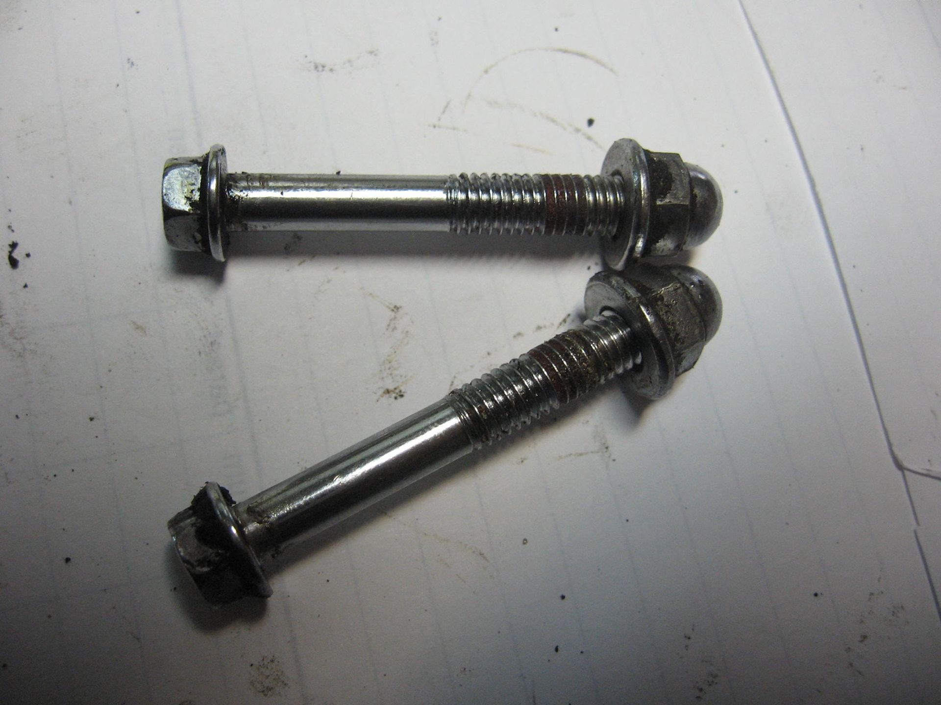 set boutjes met moer bevestiging koplamp aan steun // cmx450c 1986-87 90007-mm2-000 + 90201-415-000 95701-06040-00