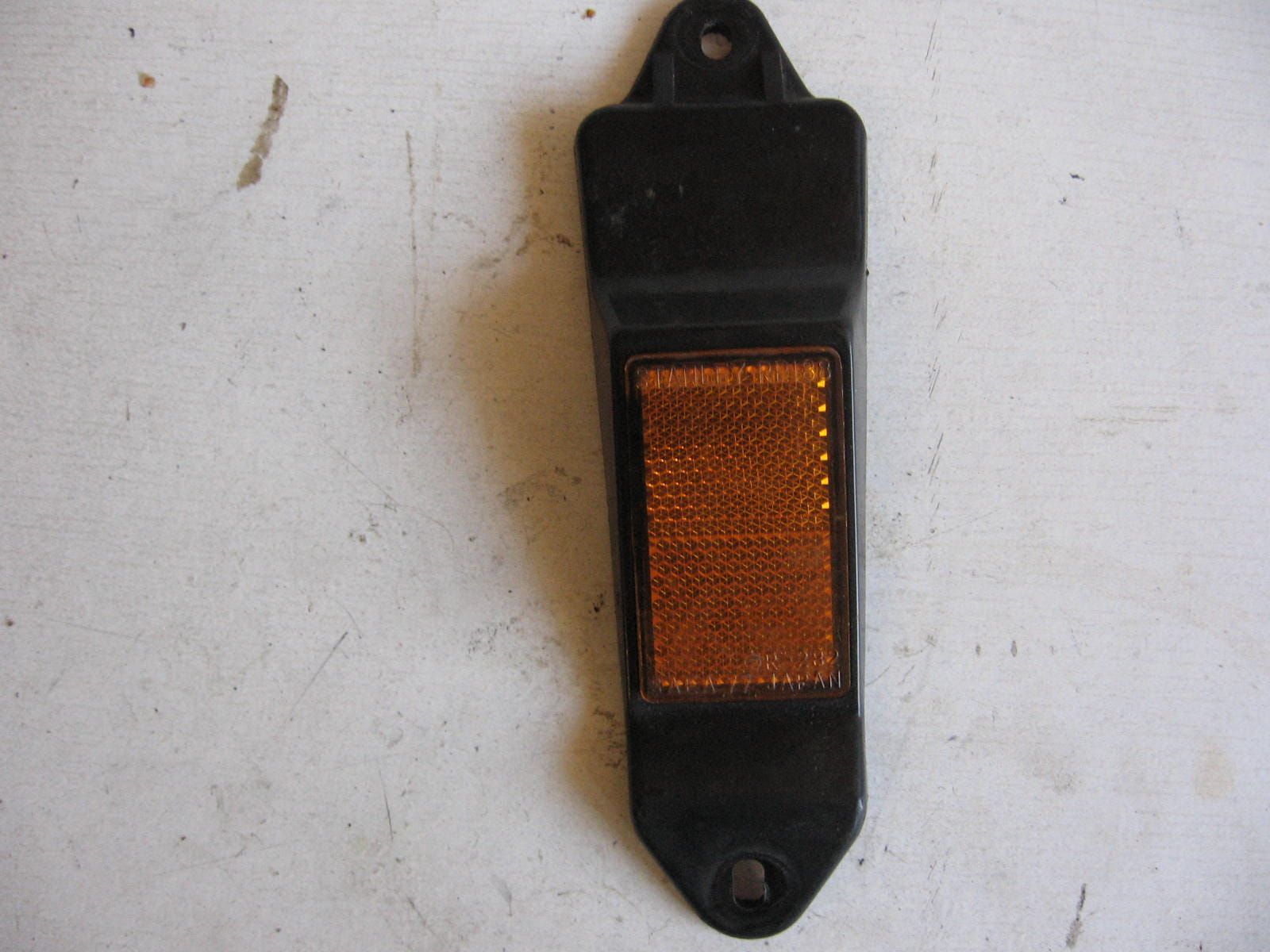 houder reflector met reflector zijkant balhoofd	Kz550c 80-83 , kz650H 81-83 , kz750H 81-83	13227-1001 , 56030-1006