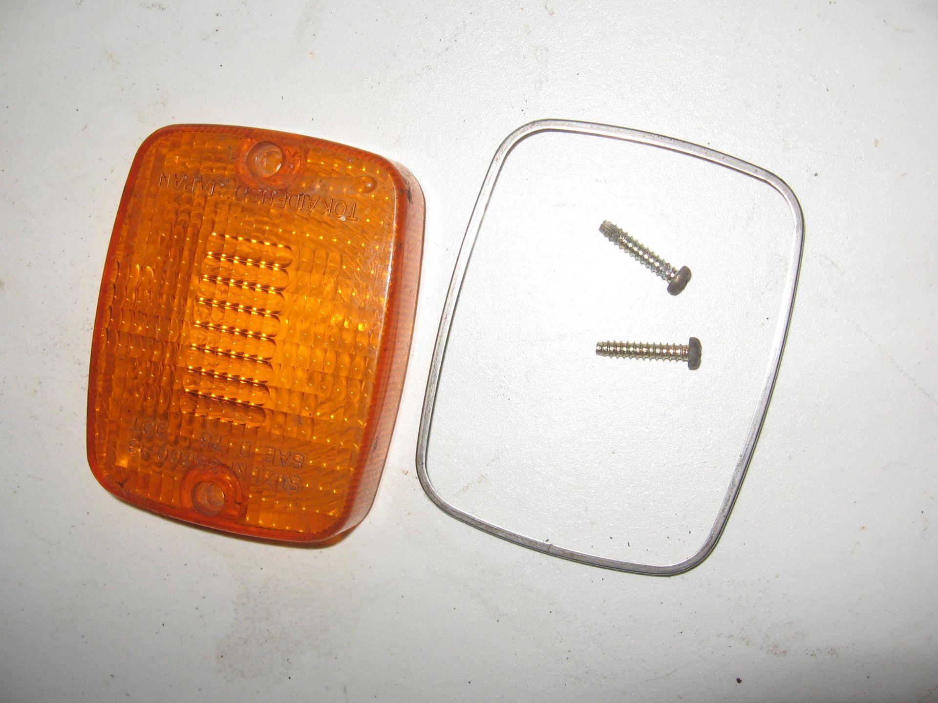 knipperlicht richtingaanwijzer glas met chromenrand // gsx400e  , 35611-49230 +35612-49231	35652-44182