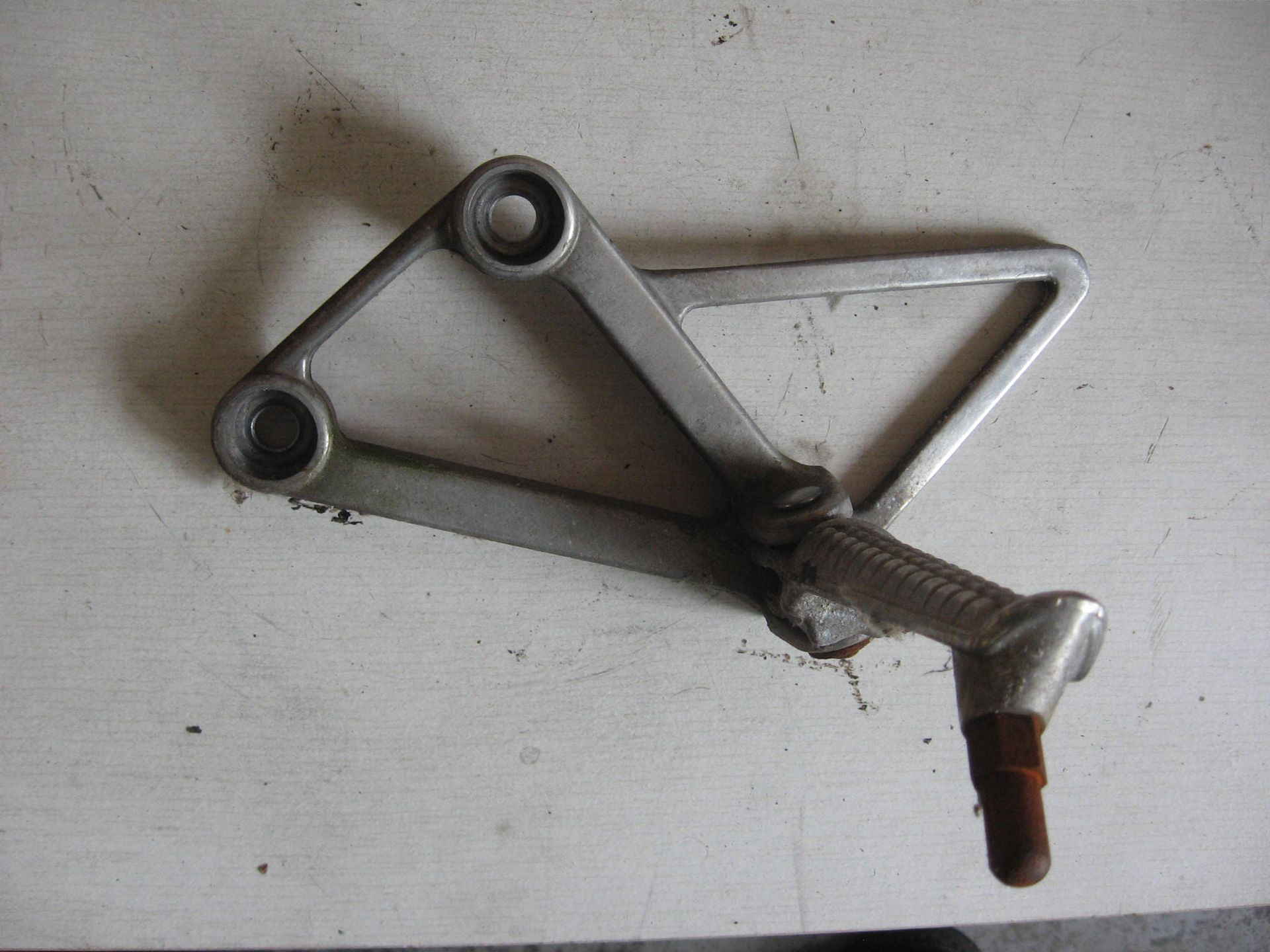 voetsteunhouder links voor met step 	Vfr400rg 1986	50700-ml0-000 + 50640-ml7-000