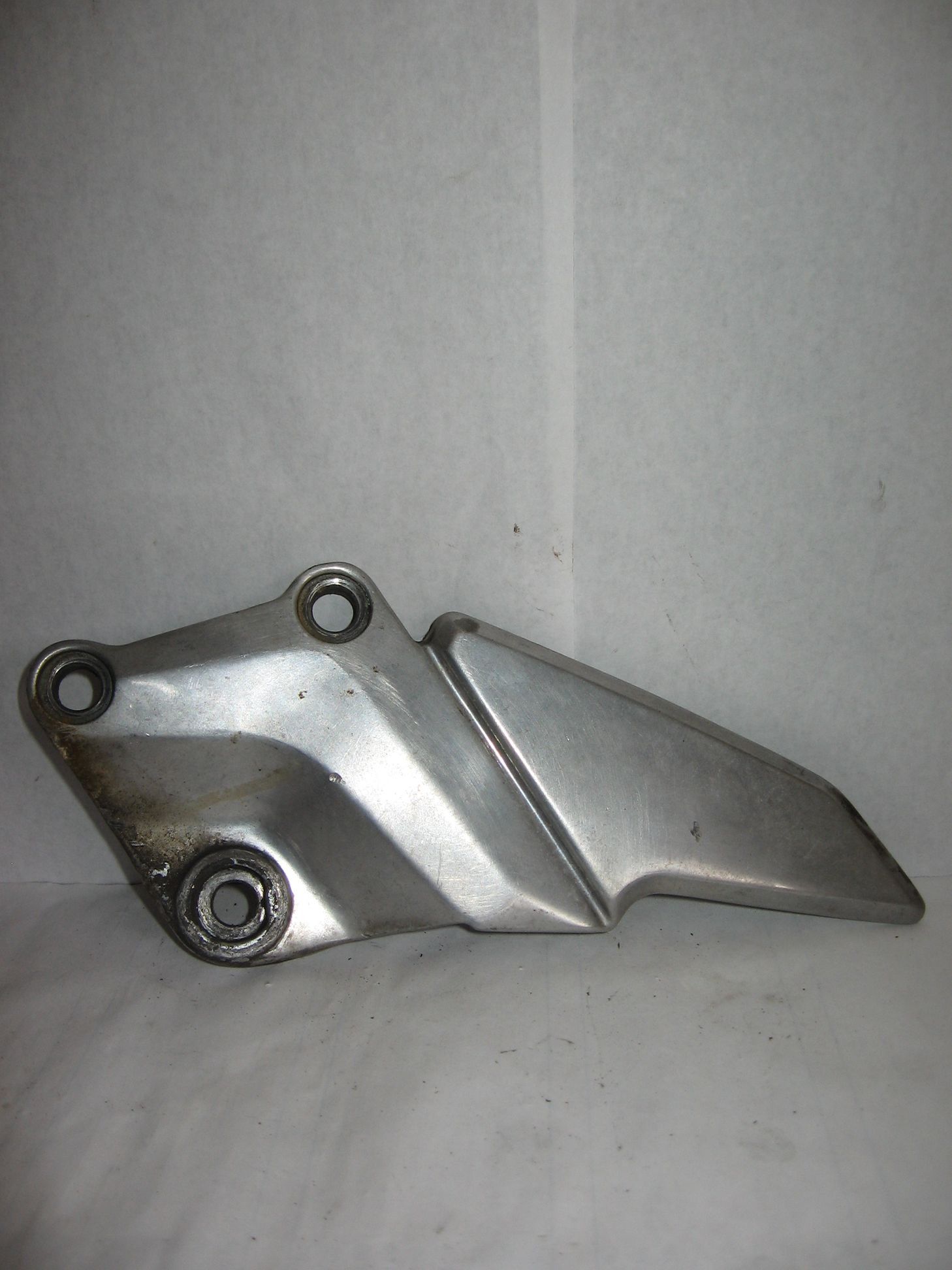 schetsplaat voetsteunhouder  links voor 	zzr600 90-93	35011-1477