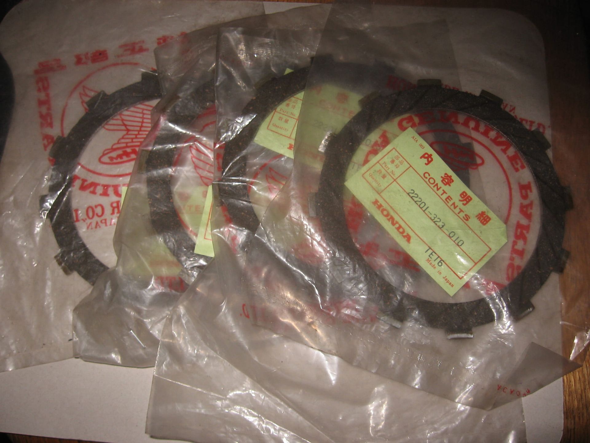 5x koppelingsplaat gevoerd –(Ontbreekt 1 op foto) 	cb500k0 k1	oem		22201-323-010