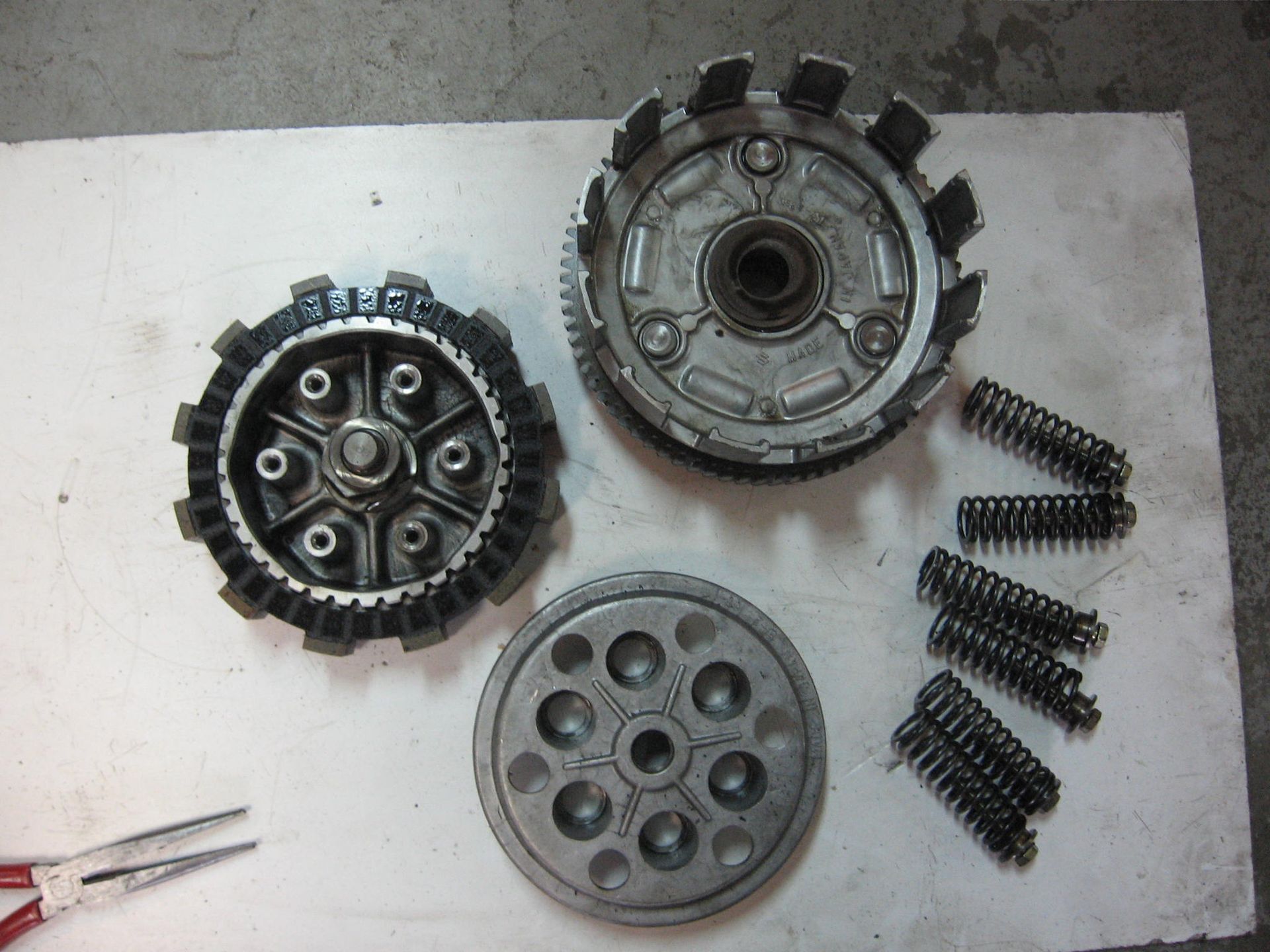 Koppelingshuis + tandwiel oliepompaandrijving – gs500 1989-2007		21200-44101 + 21411-44101 + 21462-16501 + 16321-01d00	21200-44102 / 21462-14301 / 16321-01 d10