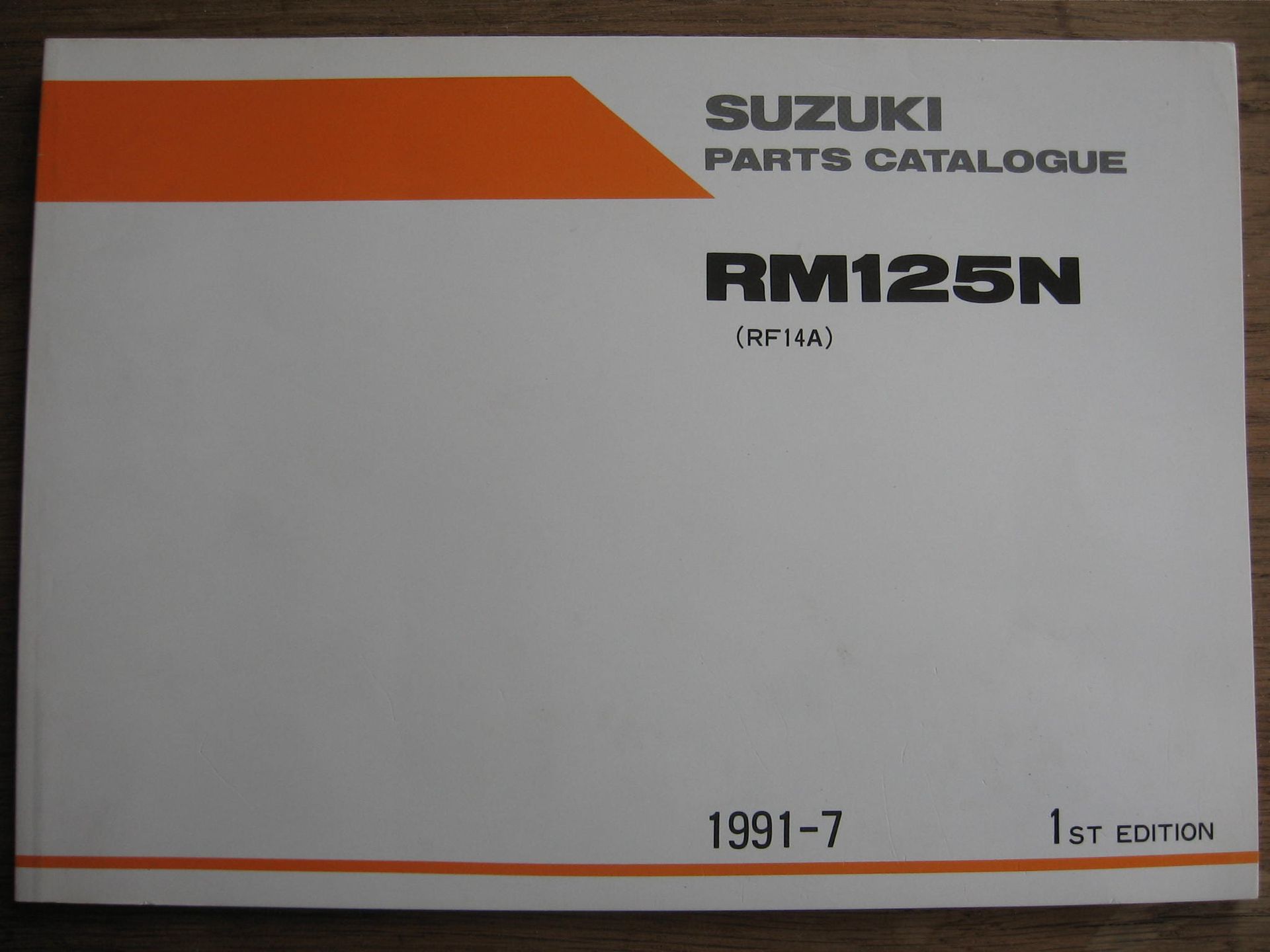Suzuki origineel parts catalog / manual  uit 1991-7 1e editie 	RM125N		9900B-20051