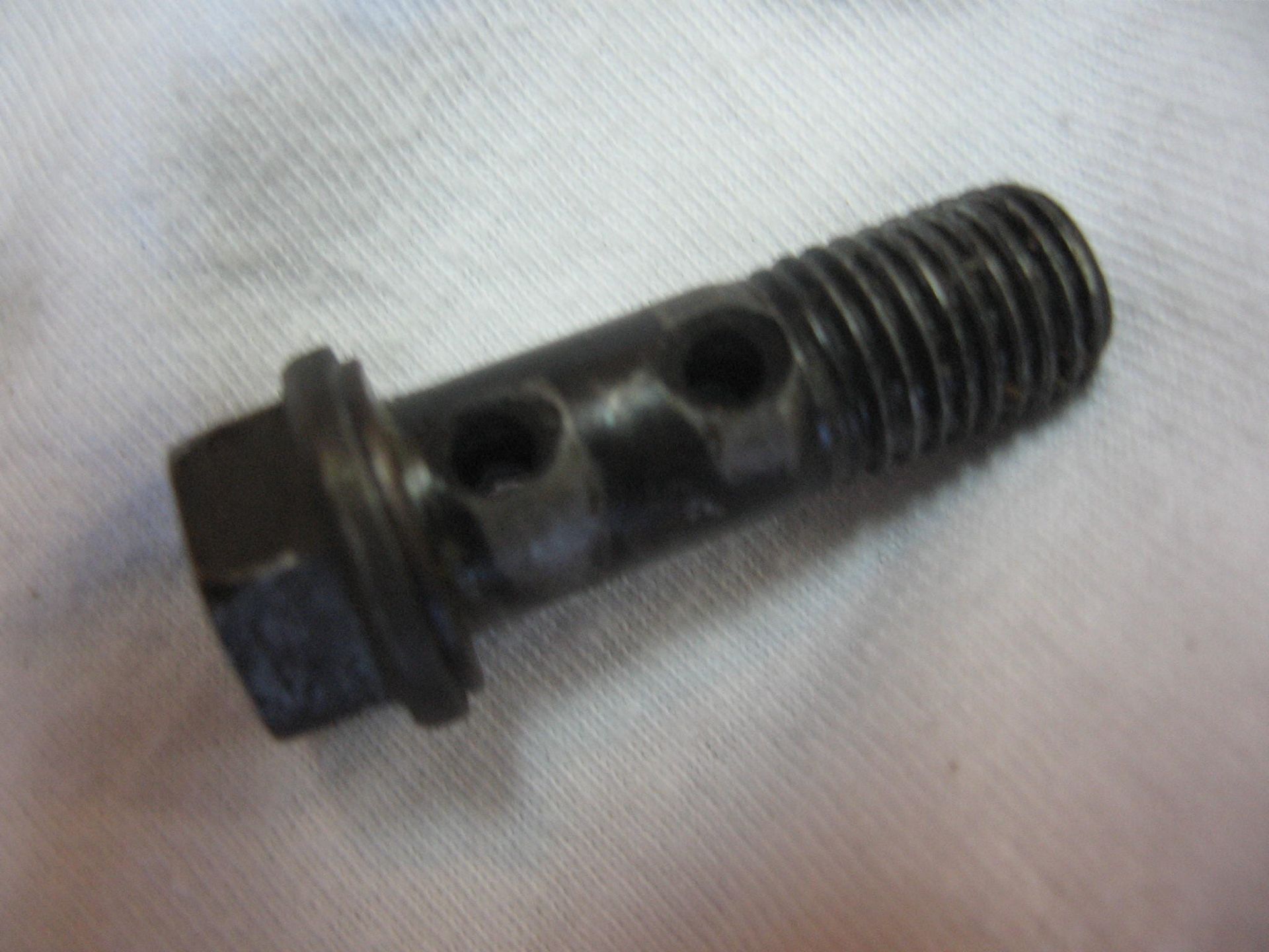 dubele banjobout rem		90401-10038 , M10x1,25  goede staat