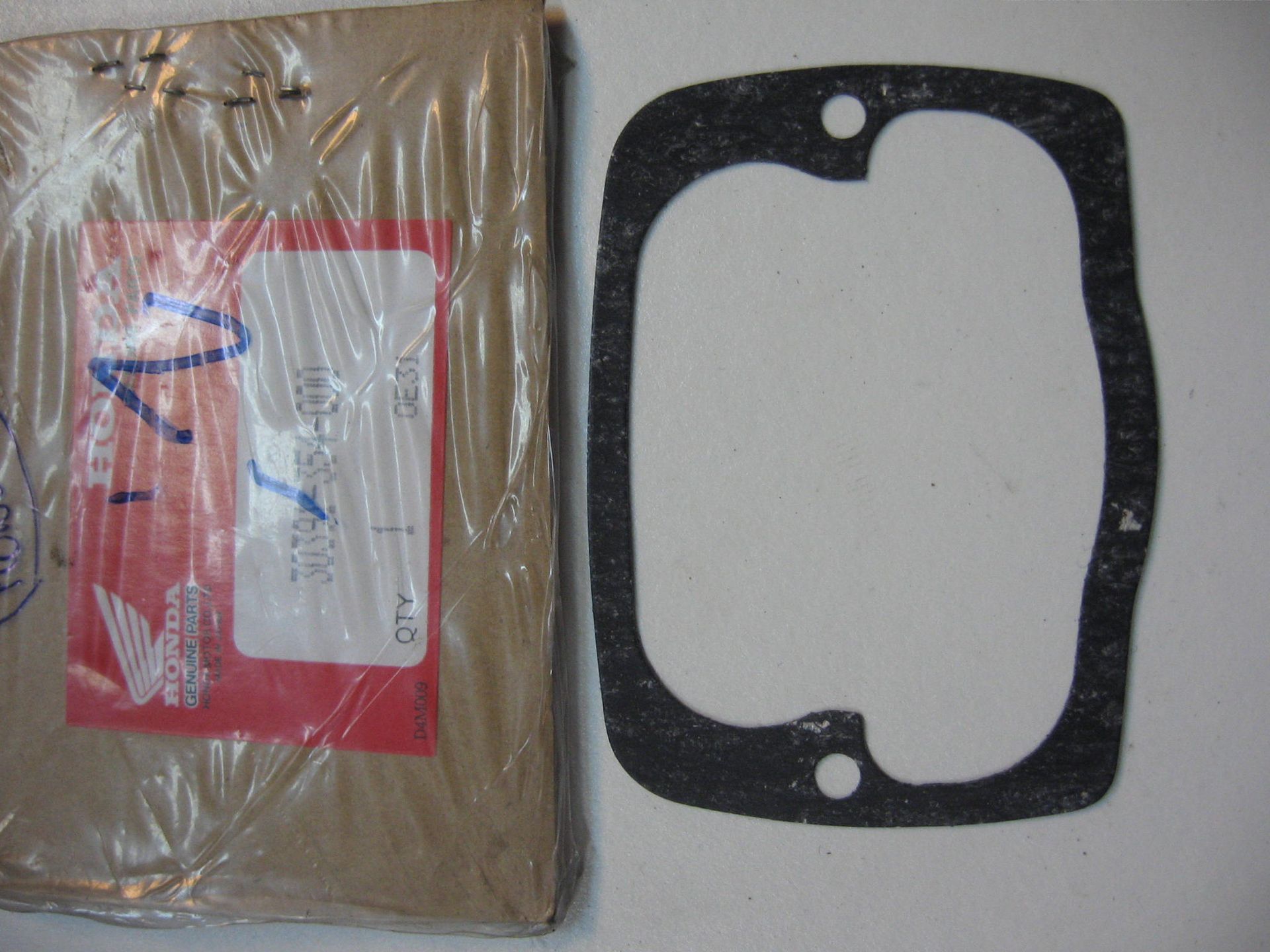 pakking point cover // cb200 1974-76		oem		30391-354-000