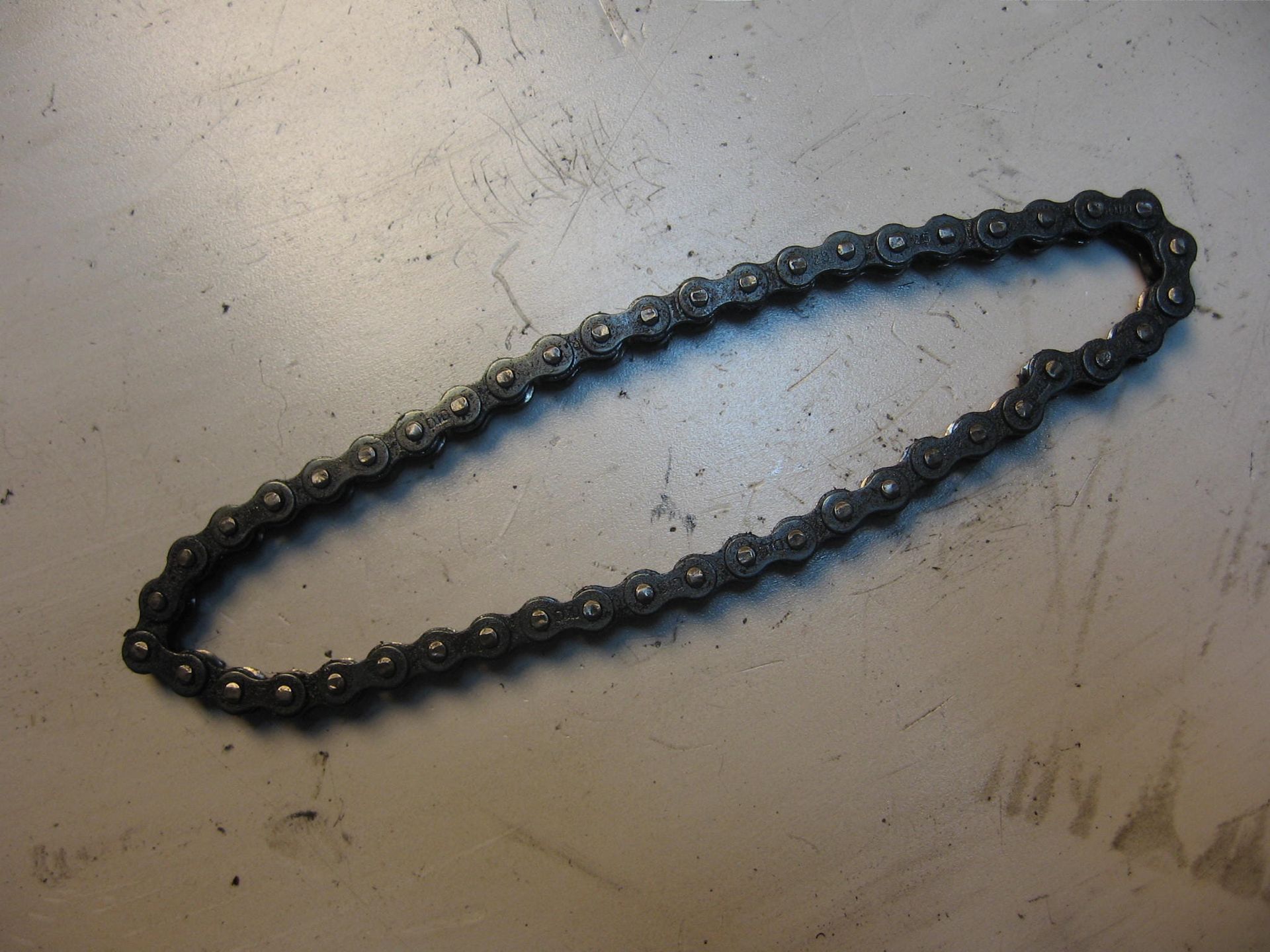 ketting oliepomp aandrijving -- cb400n 1981		15110-413-010	15110-413-020