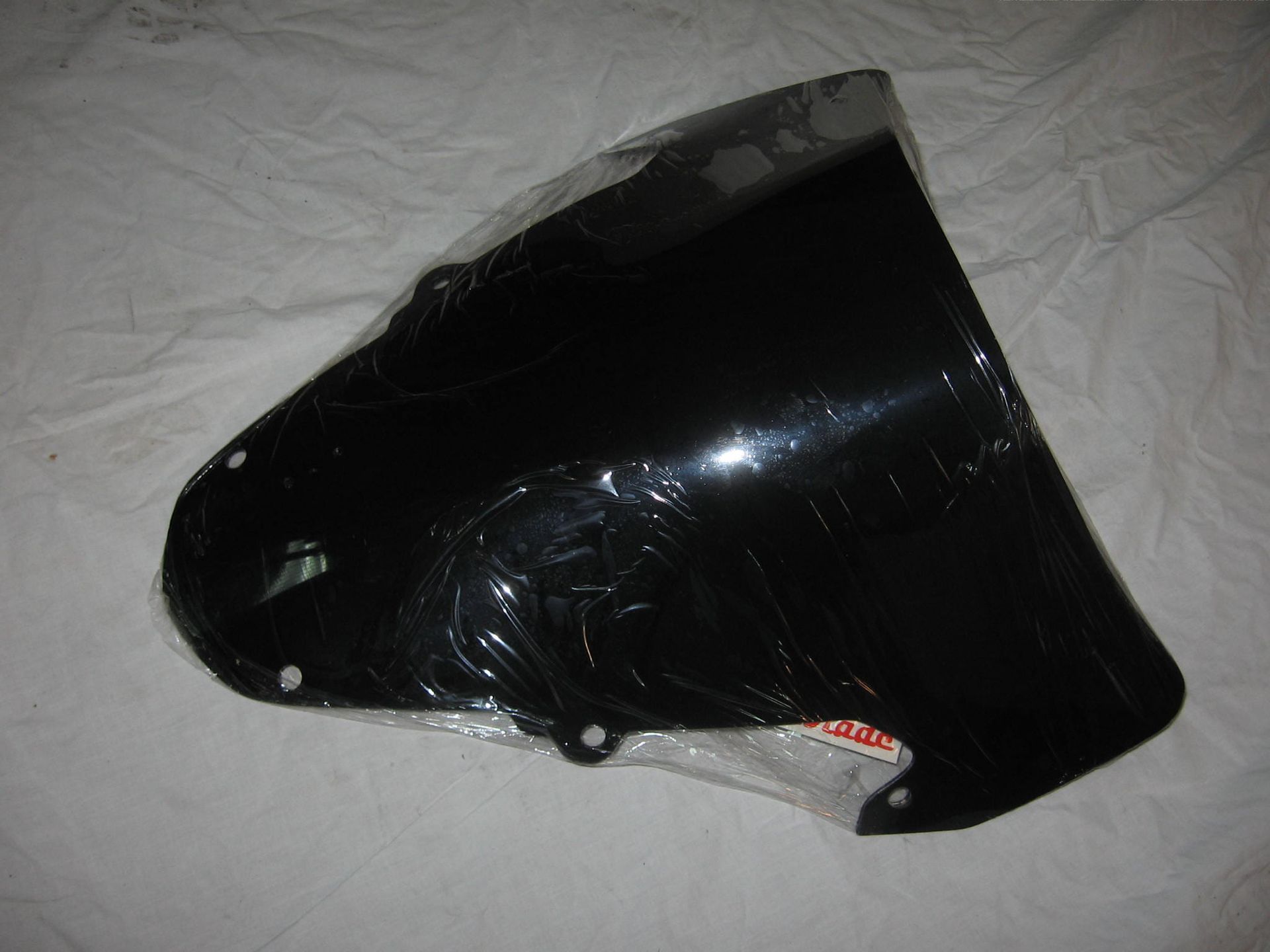 kuipruit dark smoked // gsxr1000 2003-04	Fabrieksfolie zit er nog op	airblade	SCRS030