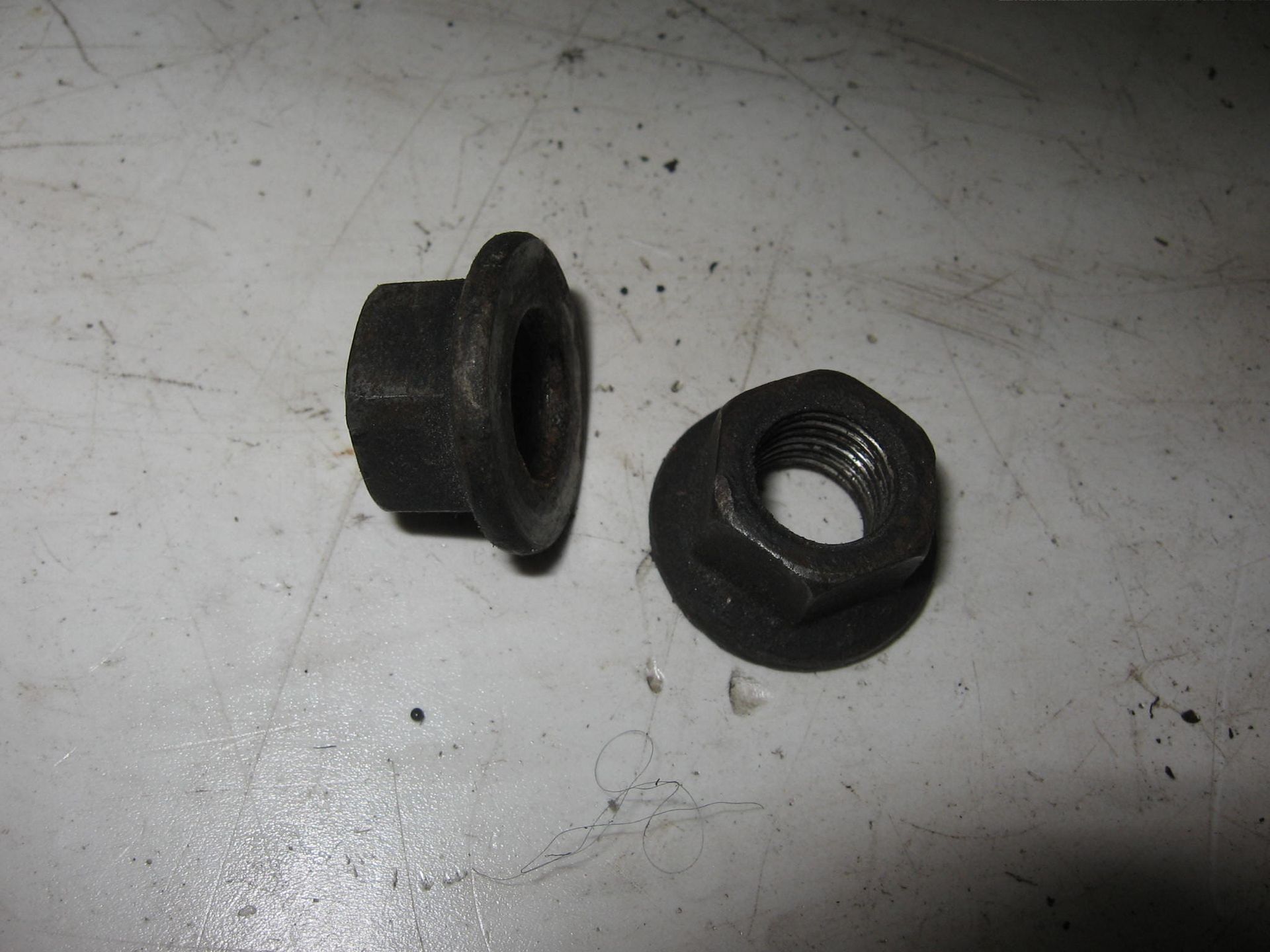 2x moer bevestiging kopsteun // tr1		90179-12248	90179-12657