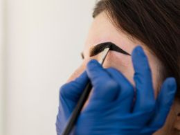 Woman getting tinted eyebrows