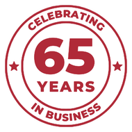 Red circular graphic celebrating 65 years in business, with text and stars.