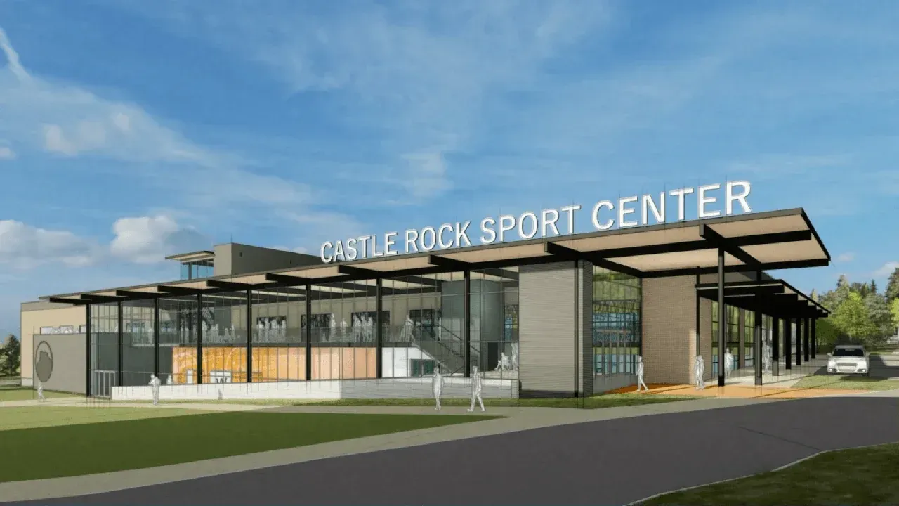 Exterior view of the Castle Rock Sport Center. Modern building with large windows and a covered entrance.