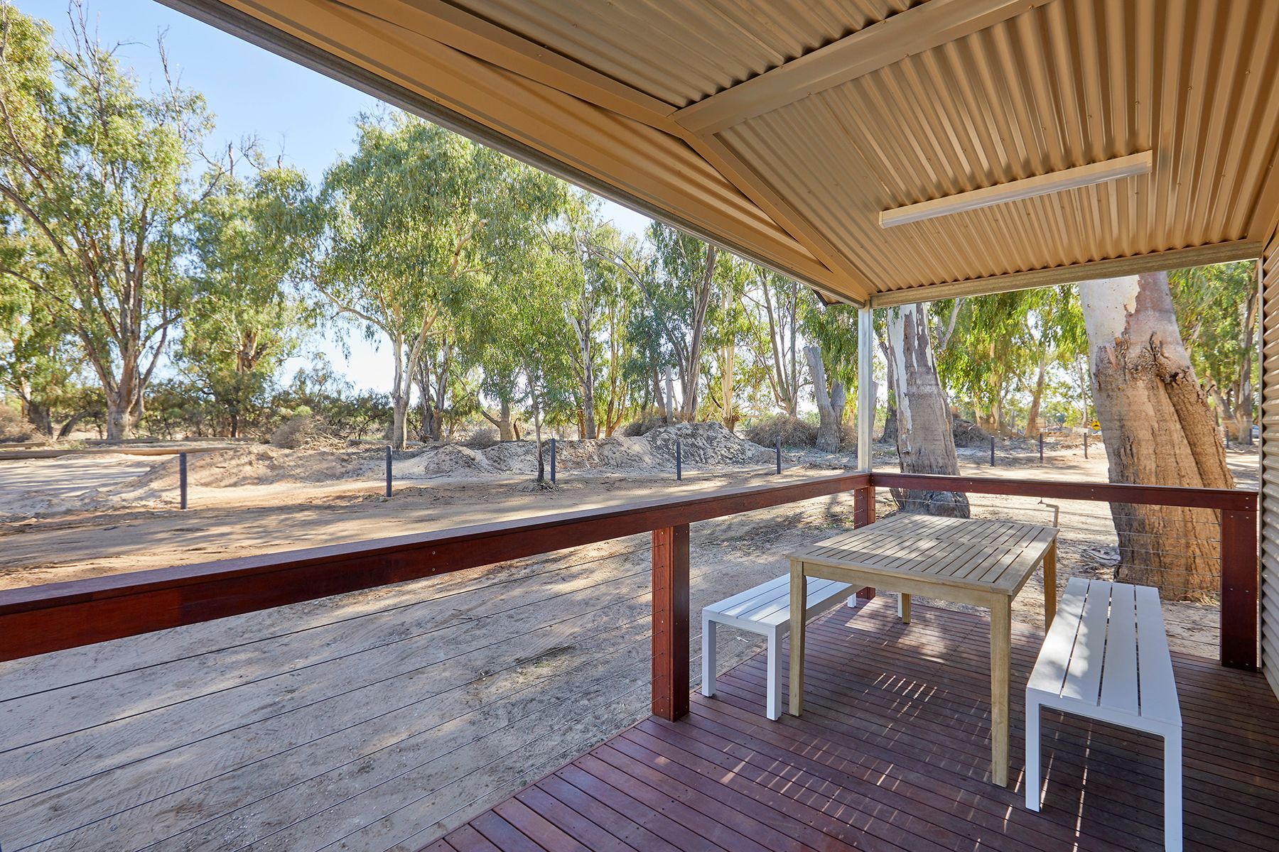 Apex Riverbeach Holiday Park cabin outdoor dining , deck , alfresco