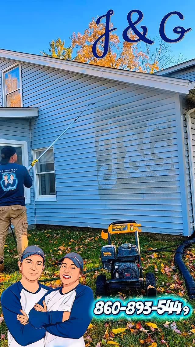 J&G sign over blue house; two workers and a mower in front, with phone number 860-895-5749.