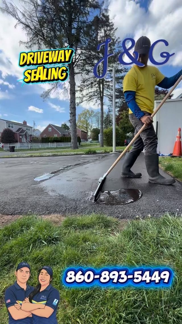 Driveway sealing worker smoothing fresh blacktop with squeegee; phone number and company logo displayed.