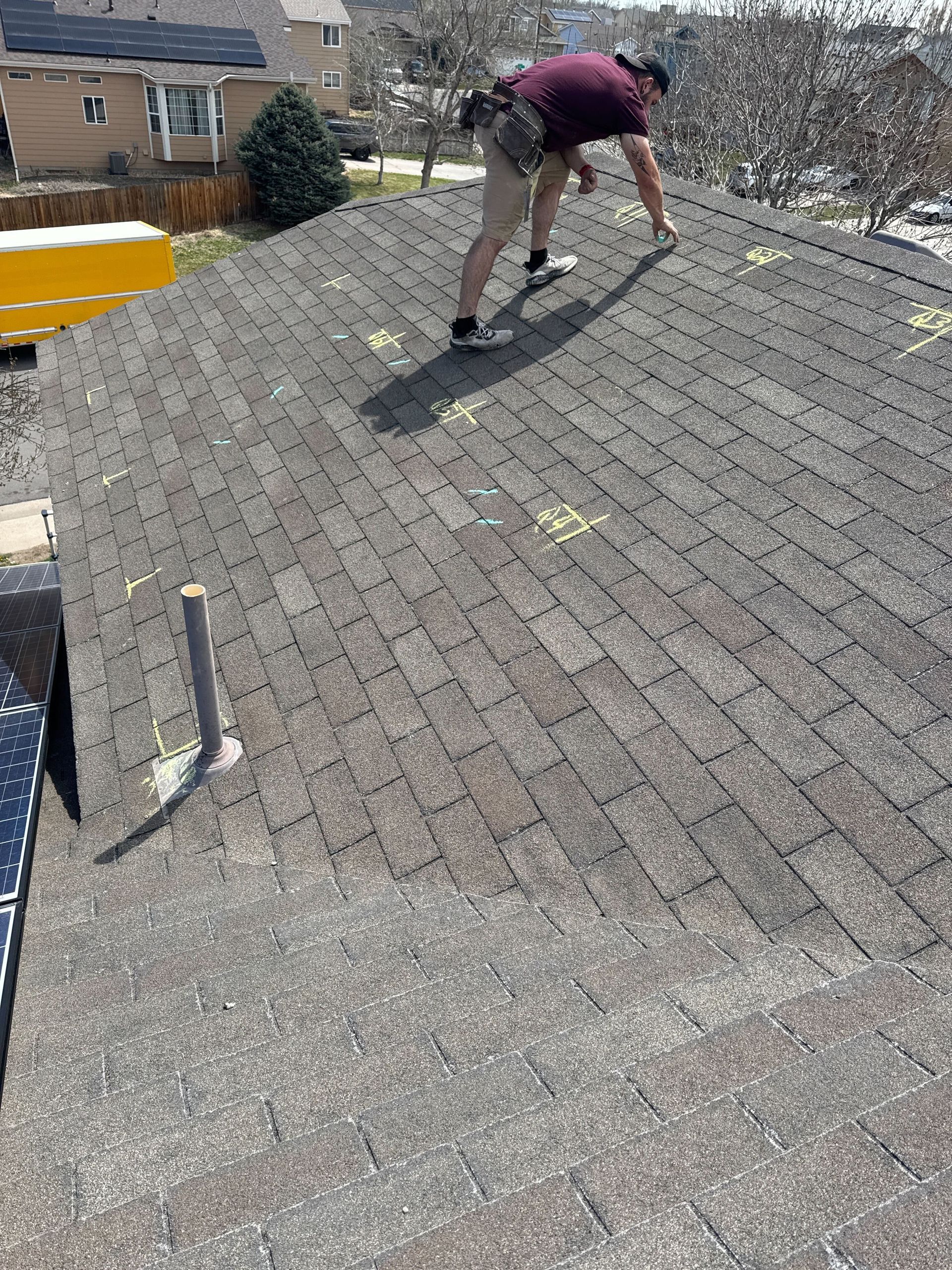 Precision Exteriors Restoration inspector documenting a Westminster roof for an insurance claim