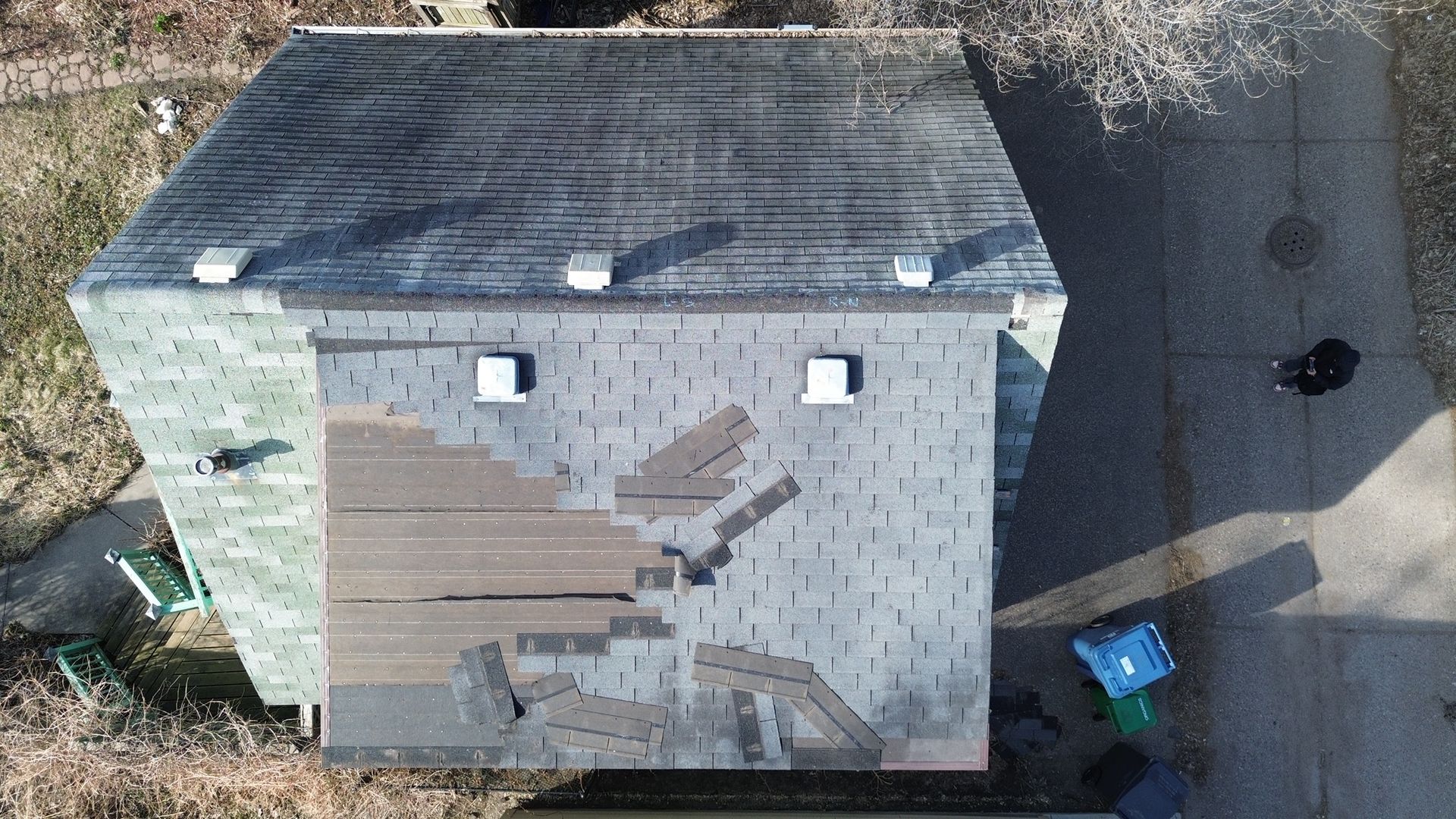 Wind damaged roof on a Westminster, CO home before replacement
