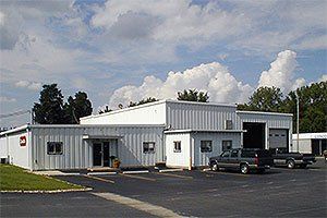 Office with Cars Parked — Columbus, IN — David’s Inc Office with Cars Parked — Columbus, IN — David’s Inc