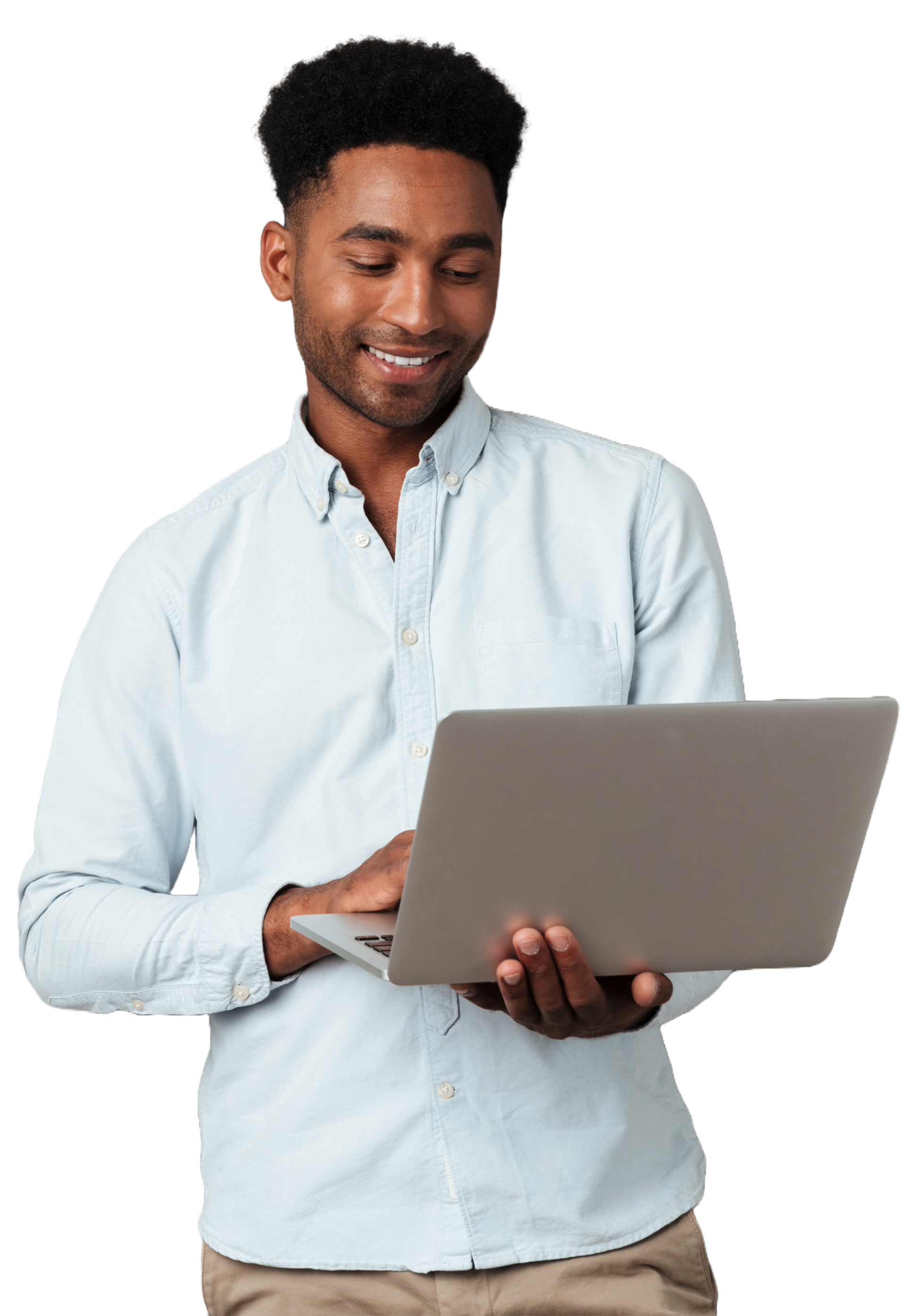 A man is holding a laptop computer in his hands and smiling.