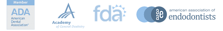 A blurred image of a few logos including ada fda and endodontists