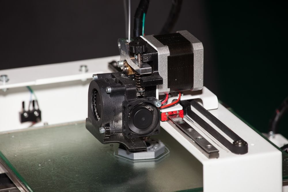 A Close Up Of A 3d Printer Printing A Piece Of Plastic — D.E.M Solutions Pty Ltd In Caboolture, QLD