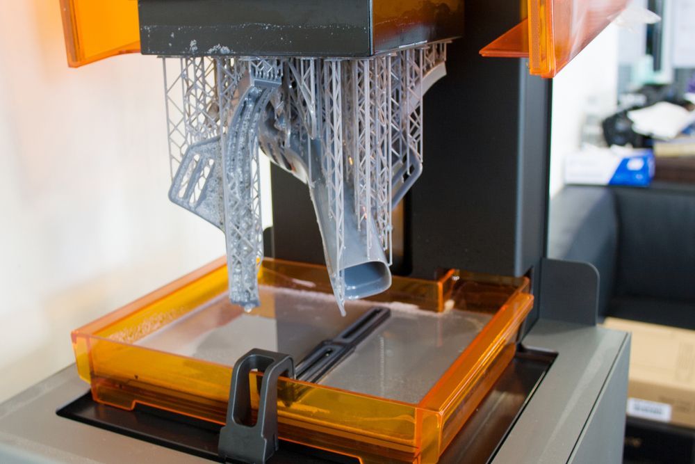 A 3d Printer Is Printing A Piece Of Plastic — D.E.M Solutions Pty Ltd In Caboolture, QLD