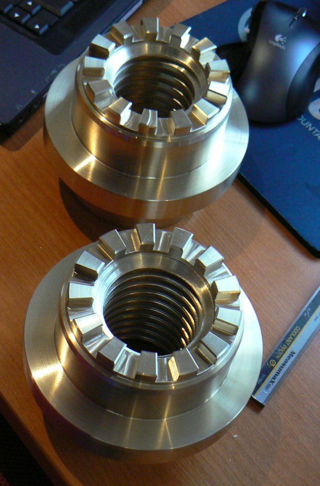 Two Nuts Are Sitting On A Desk Next To A Logitech Mouse — D.E.M Solutions Pty Ltd In Caboolture, QLD