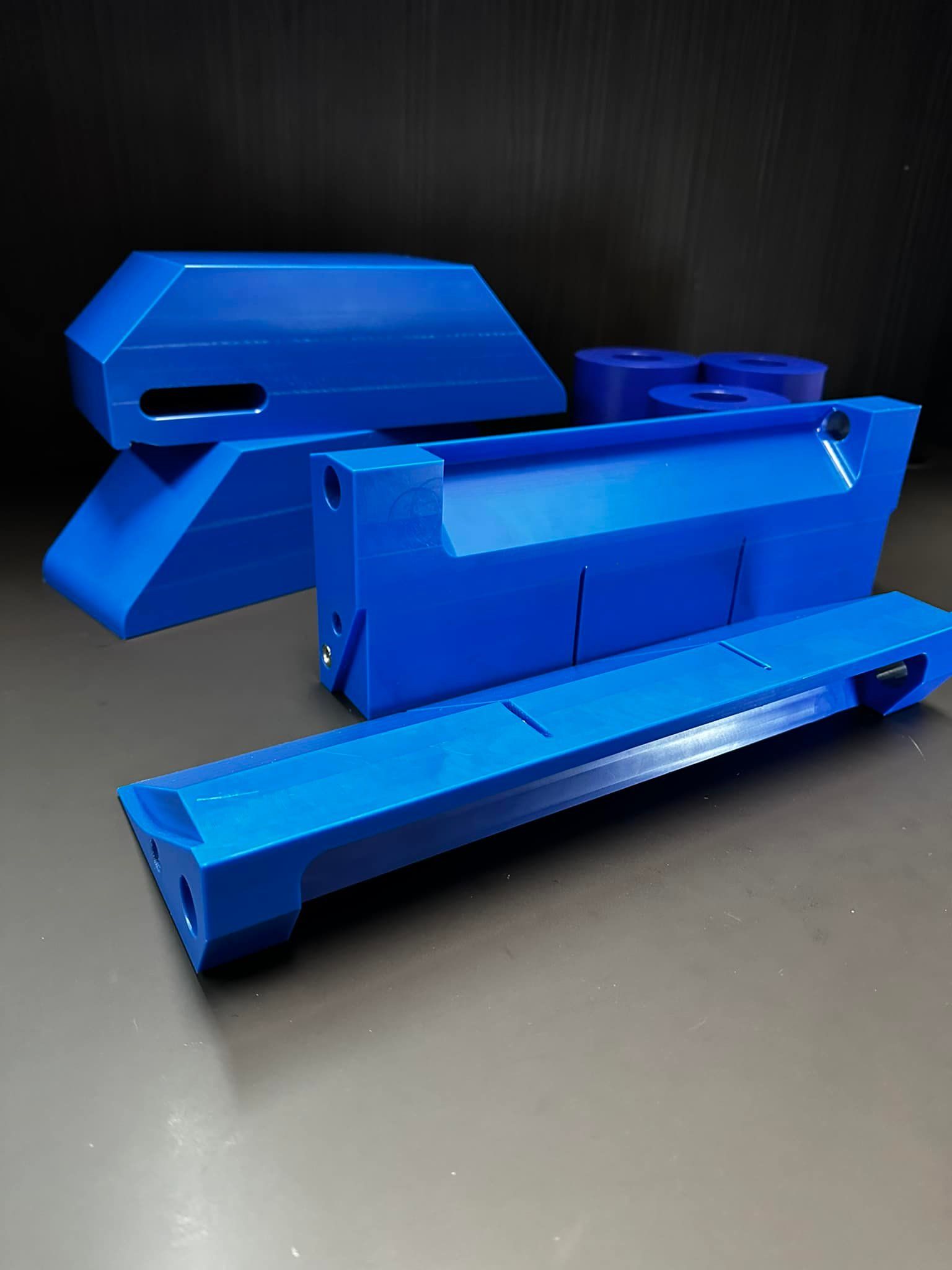 Blue Plastic Prototypes Sitting On A Desk — D.E.M Solutions Pty Ltd In Caboolture, QLD