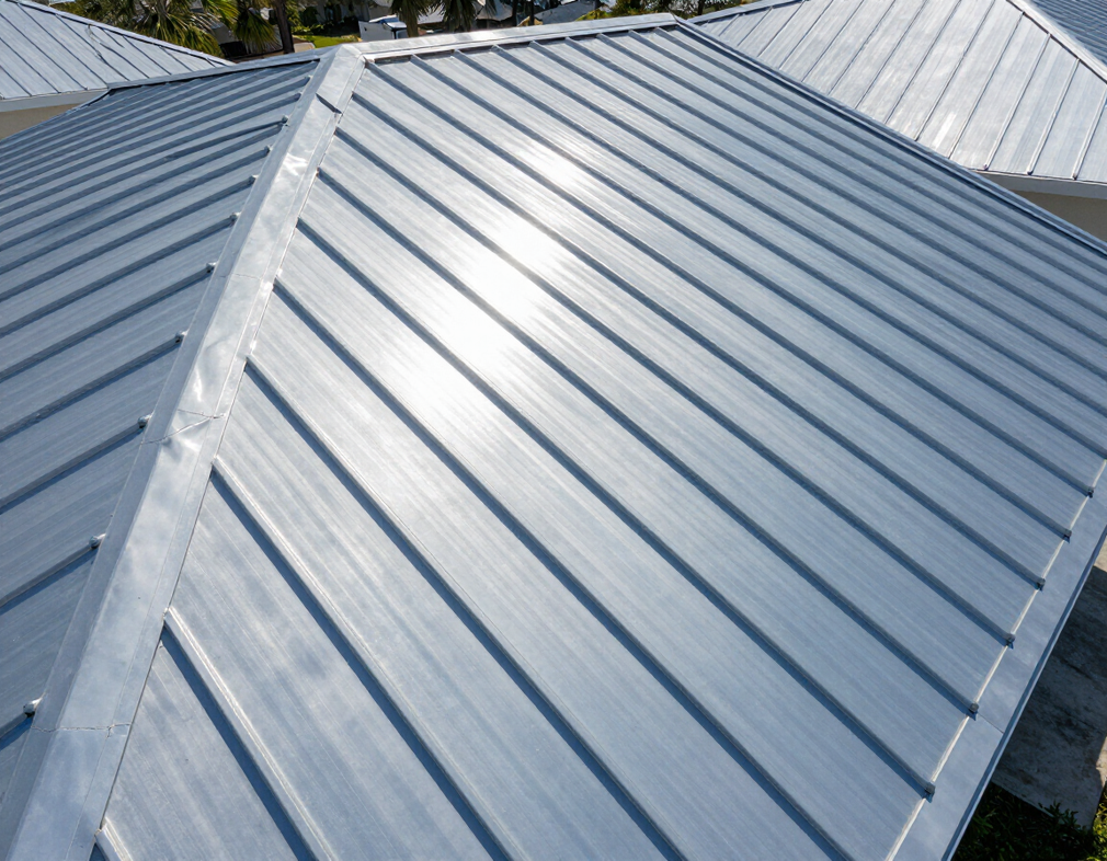 Silver standing seam metal roof panels on a Florida residential home
