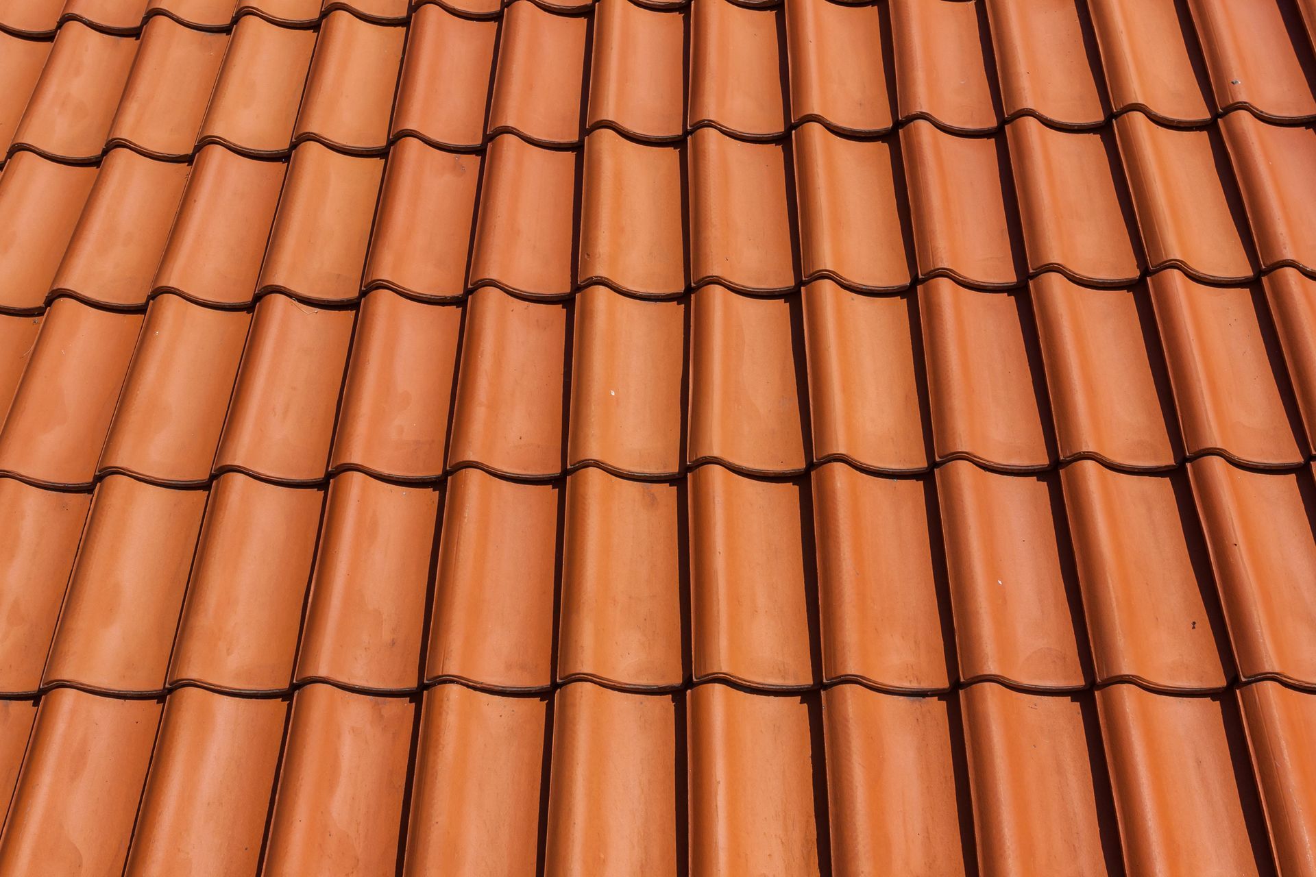 Red clay roof tiles.