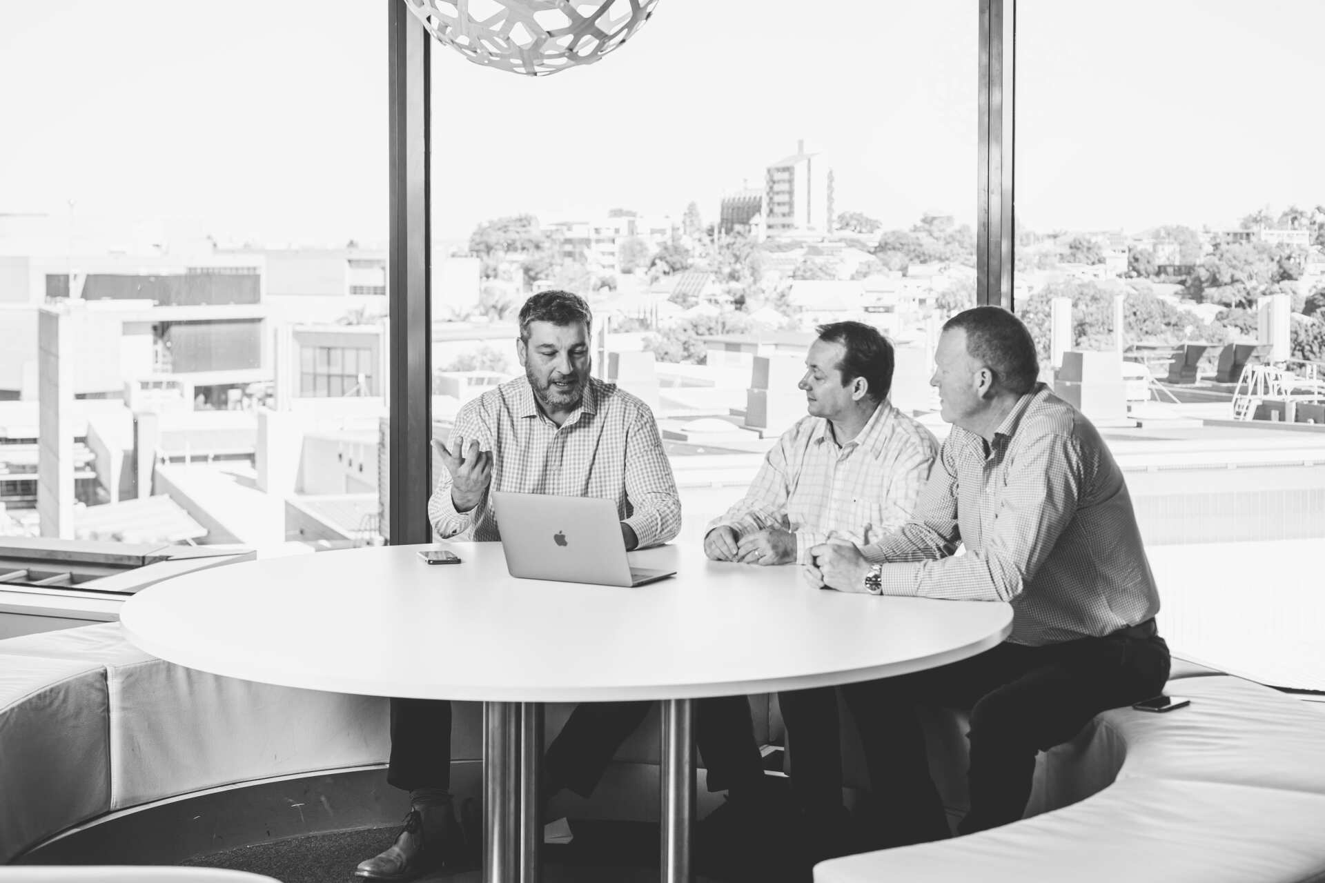 3 men talking