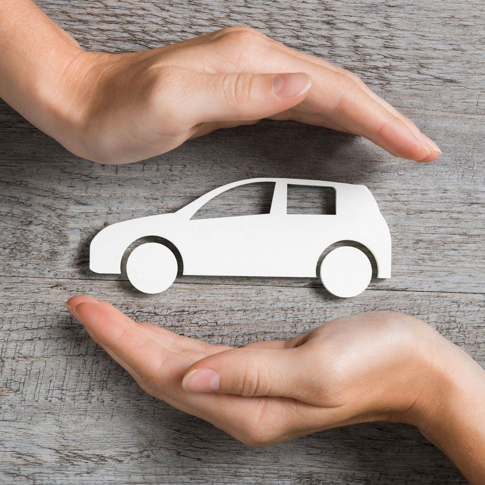Hands Protecting Paper Car — Las Vegas, NV — Silver States Insurance