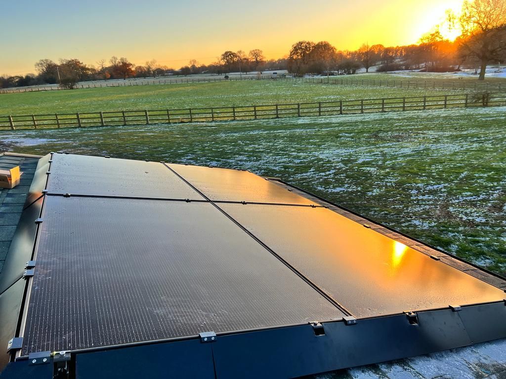 Solar panel reflecting the sun on a winters day
