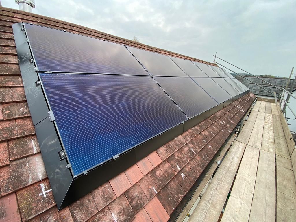 Solar panel with protective skirt