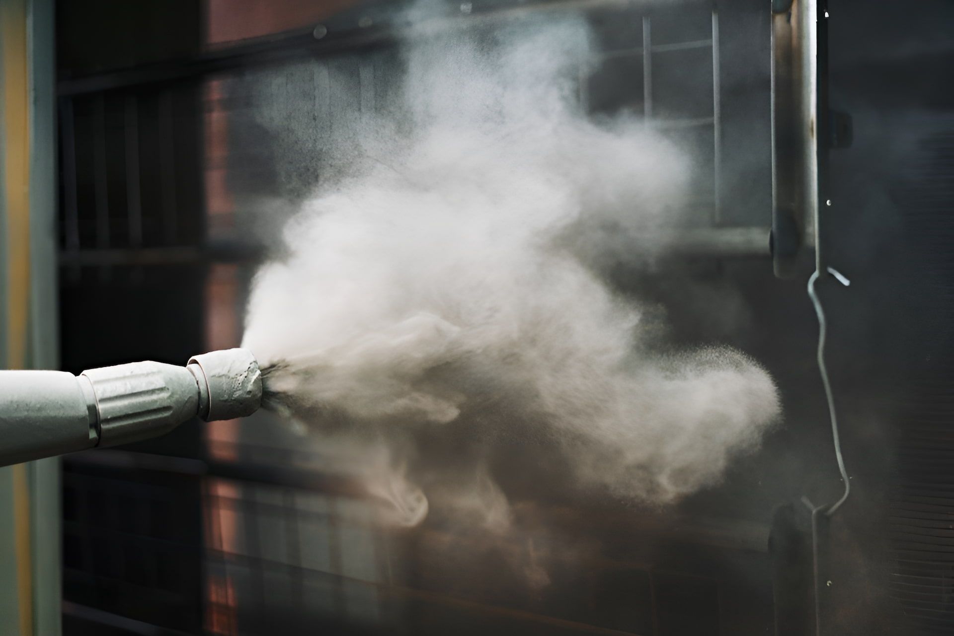A Machine is Spraying Powder on a Metal Surface — Mudgee Powder Coat Pty Ltd in Mudgee, NSW