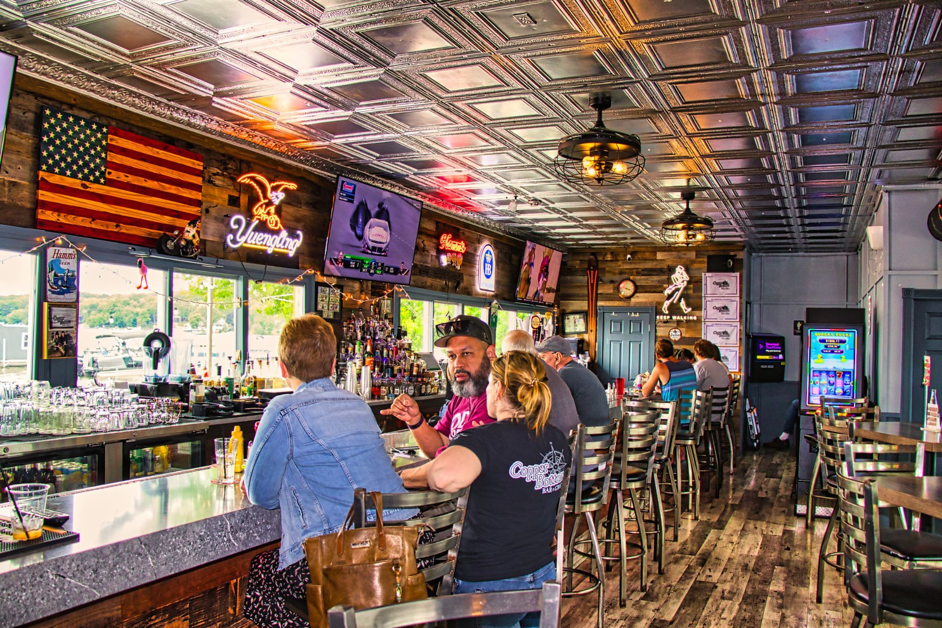 Copper Bottom Bar and Grill waterfront patio and Silver Lake view.
