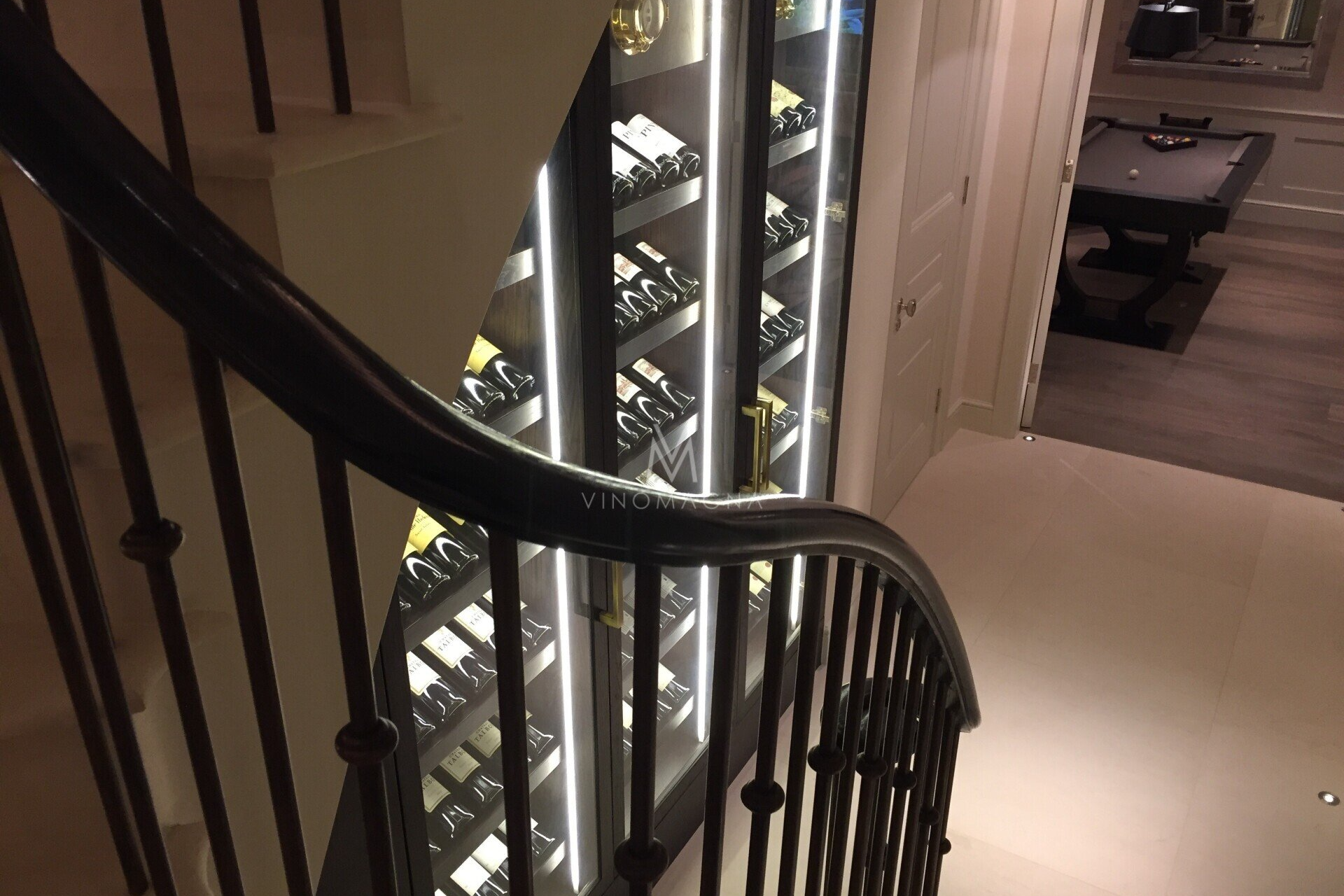 Vinomagna under stairs custom wine display view from stairs Vinomagna Under stairs custom wine display view from stairs