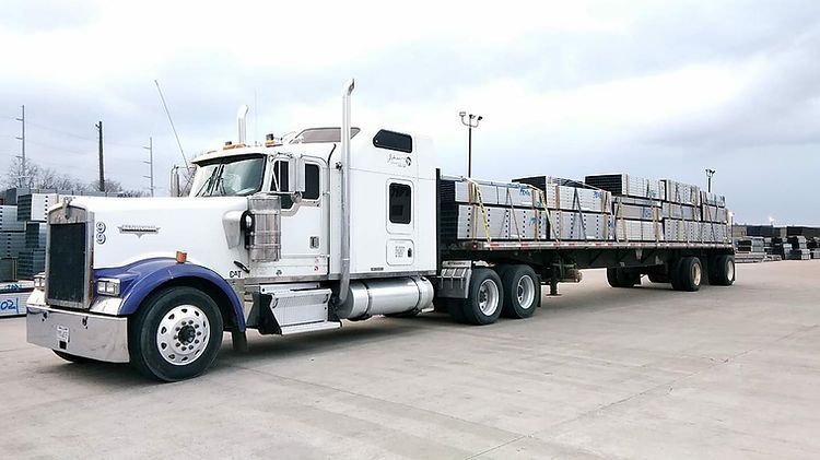Semi Truck With a Flatbed Trailer