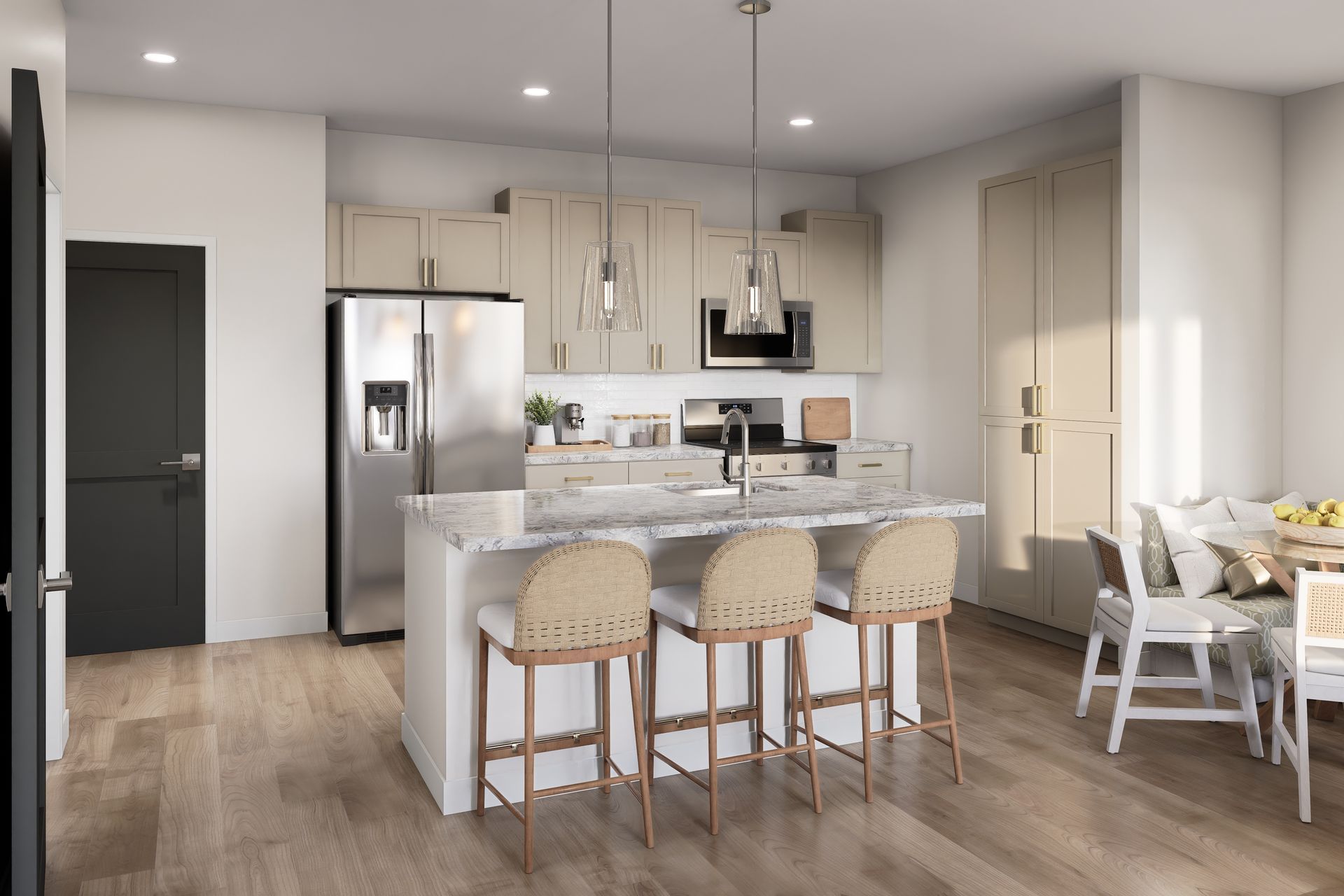 Modern kitchen and dining area with island, barstools, stainless fridge, and light wood finishes
