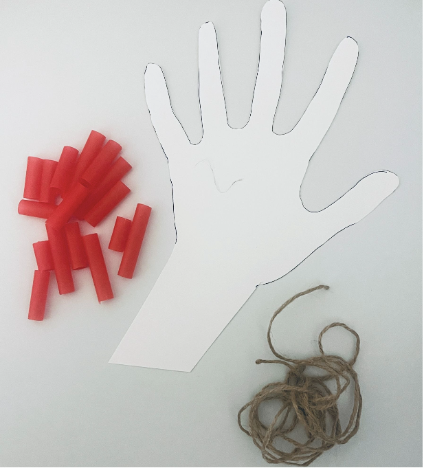 Photo of a hand cut from cardtock, straws and twine to represent the muscular and skeletal system.