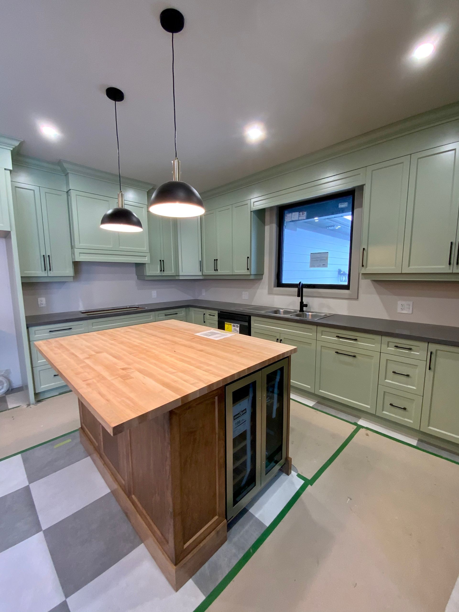 Green Kitchen 50s revival with checkered tile floors
