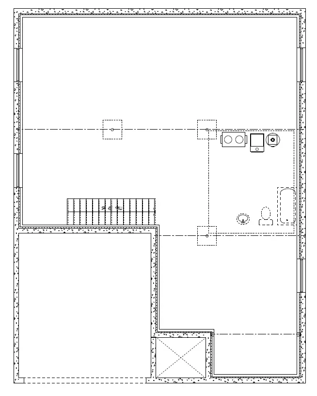A technical floor plan of a rectangular building, showing a staircase, a bathroom area, and open floor space.