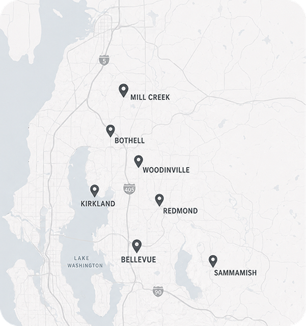 Gray map with location pins marking Mill Creek, Bothell, Woodinville, Redmond, Kirkland, Bellevue, and Sammamish.