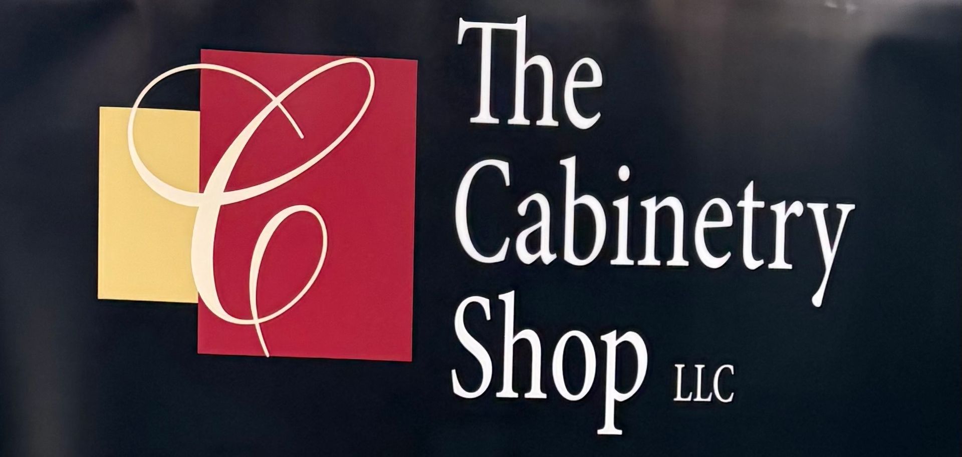 The Cabinetry Shop LLC Logo