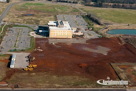An aerial view of a building with the words aerial innovations on the bottom